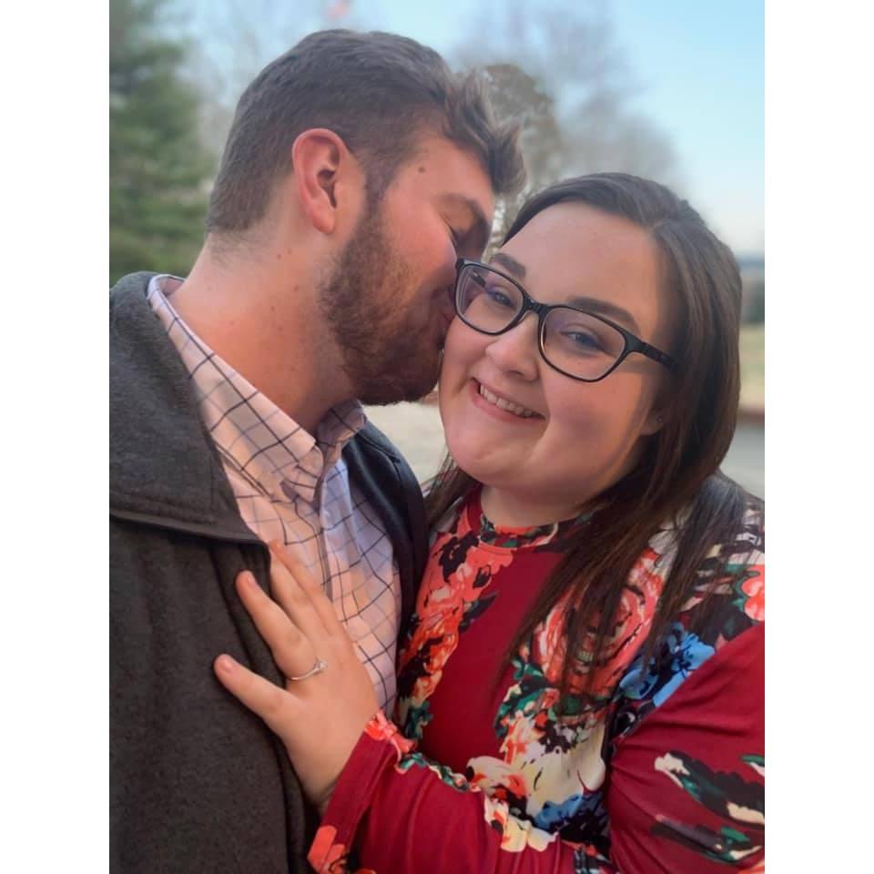 I absolutely love this picture of us. It was taken after he proposed. I was completely shocked and had no idea he had even gotten a ring.