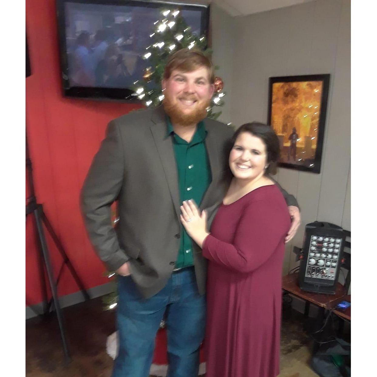 Simpson Security Employee Christmas Party! Fiance brag: We snapped this pic right before Logan won the Manager's Choice Award!