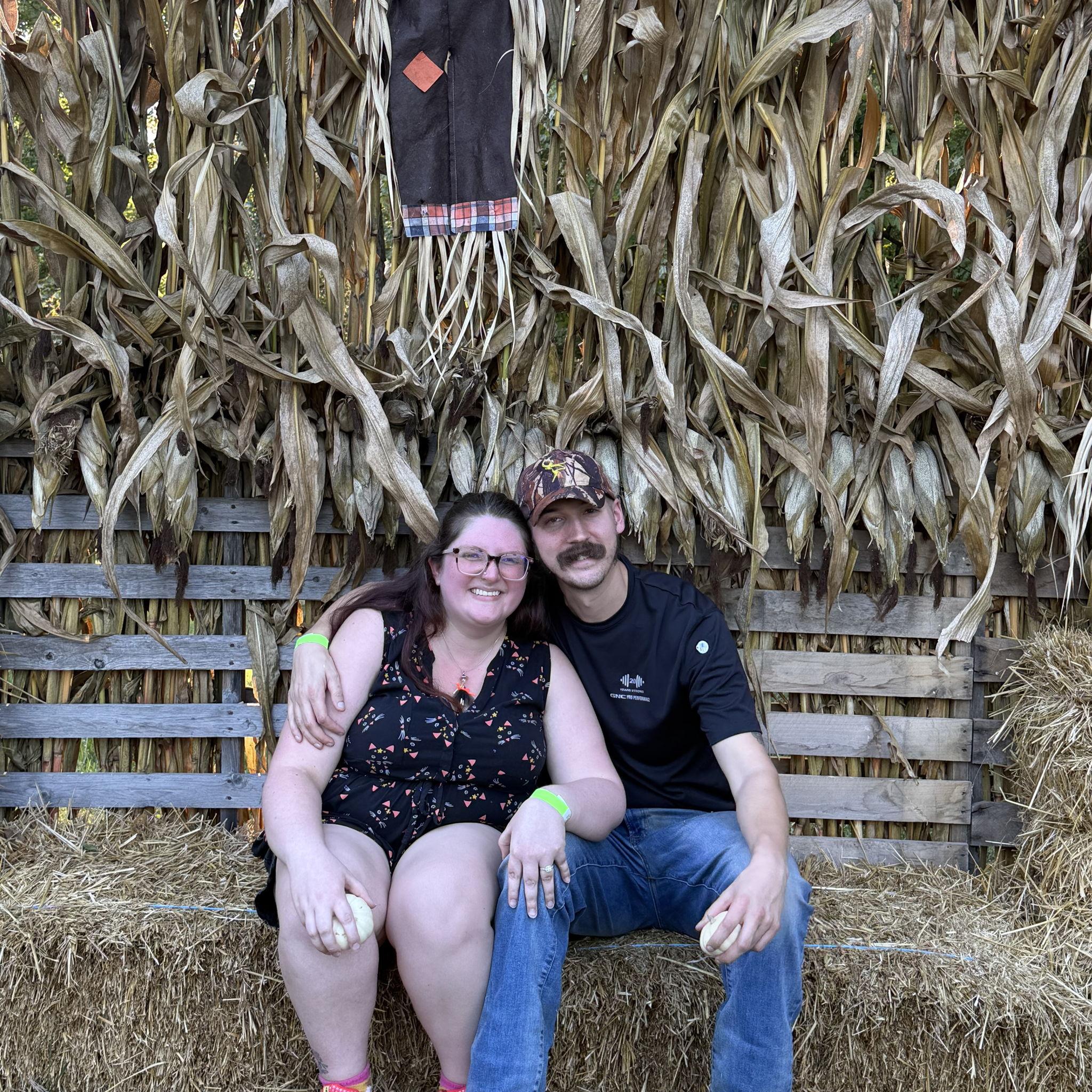 Taking pictures after a long day of fun fall activities including a corn maze, hayride, playing connect 4, a petting zoo and much more! 
10-04-2025