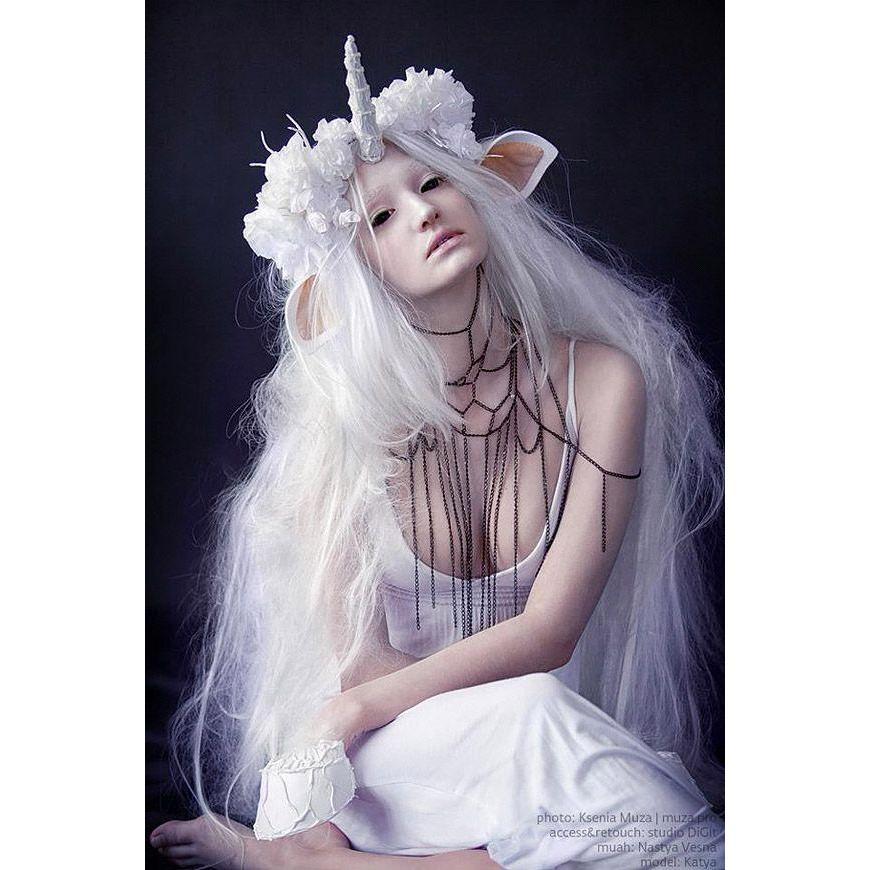 Unicorn with horn and ears and black contacts!