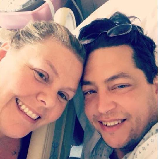 Our first post-op photo.  Special thanks to Dr. Welsh, because without him, we wouldn't be WALKING down the aisle together today or enjoying our first dance as husband and wife. We are so blessed.