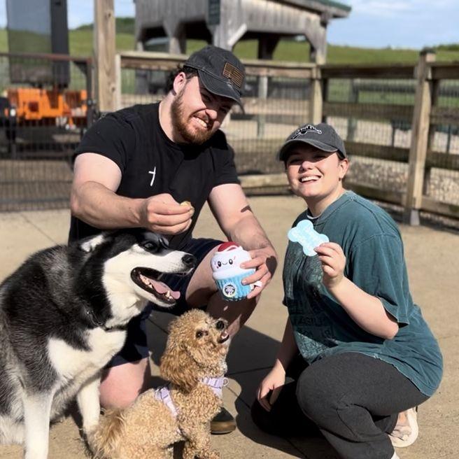 Honey's 1st birthday at the doggy park! Family photo of Joe, Kelsey, Rollo, and Honey