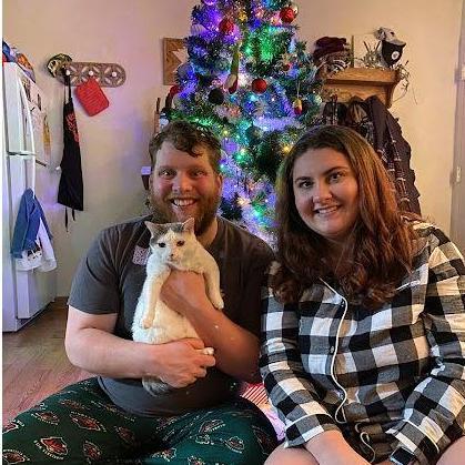 Family Christmas picture at our apartment with our cat Mikko.