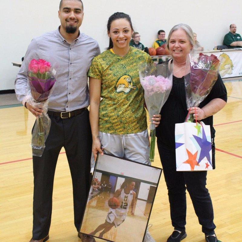 Our senior night for basketball with Katherine's mom right before Katherine'e game.
