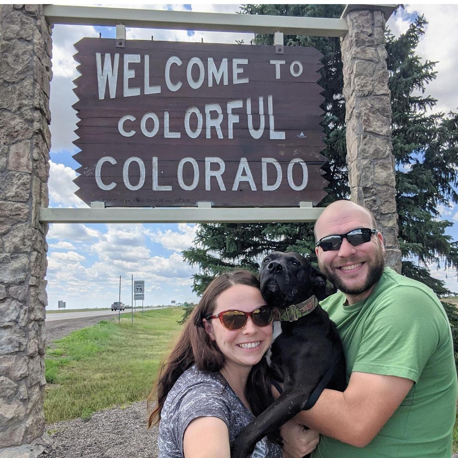 The couple (and their dog Callie) on their road trip to Estes Park for wedding planning