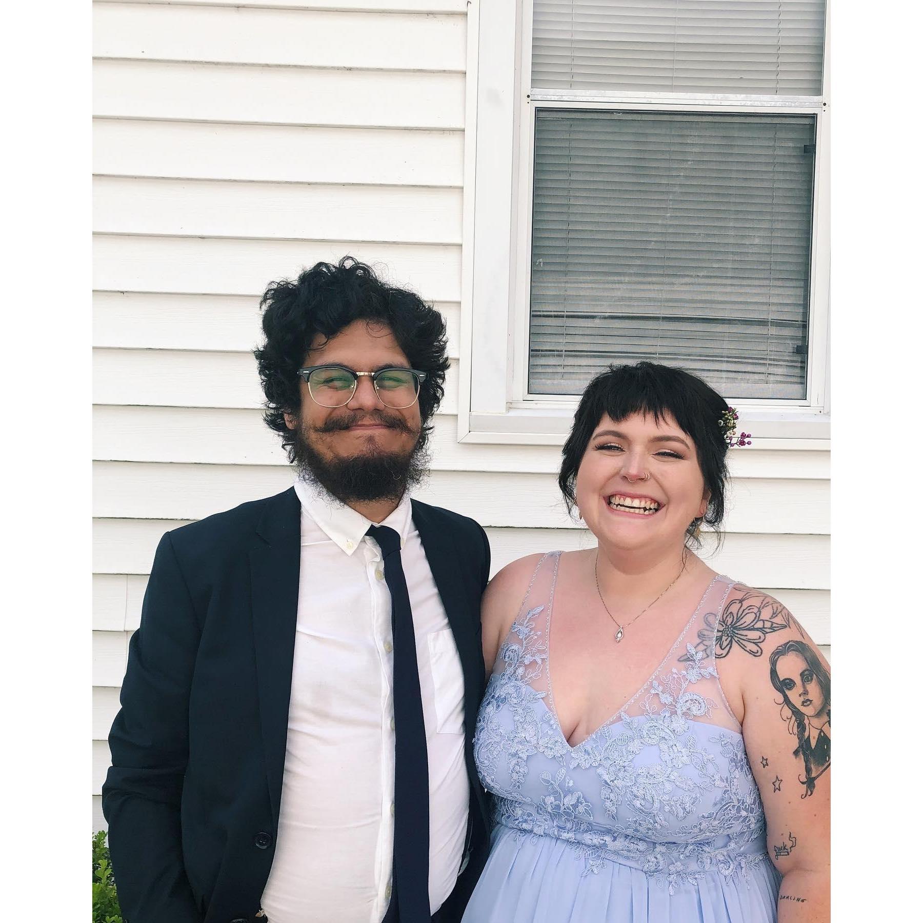 Our first photo together. Ironically, at a wedding.