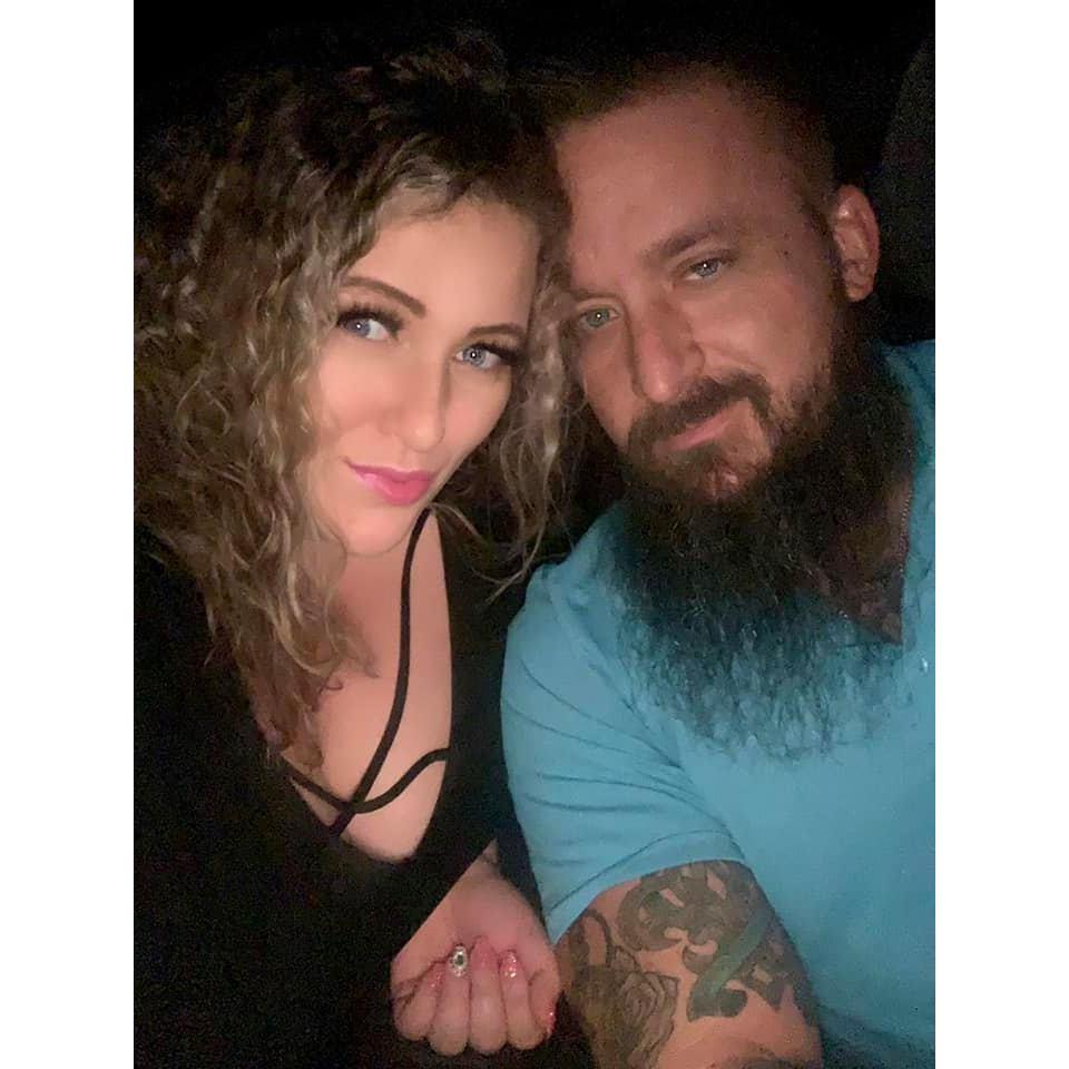 Our very first picture together, on our first date. The large stone on my ring finger nail has always been the ongoing joke on how we knew this was it. 9/30/2019