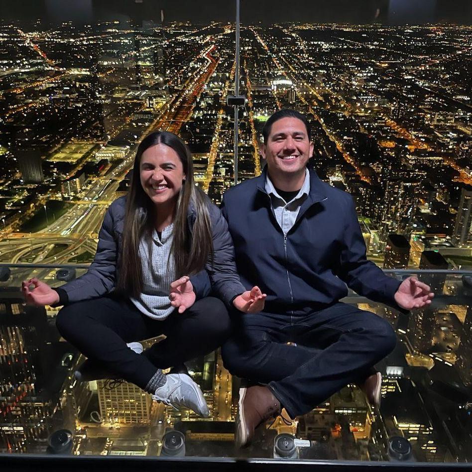 Me forcing David to meditate with me on top of the city of Chicago, even though I am afraid of heights lol