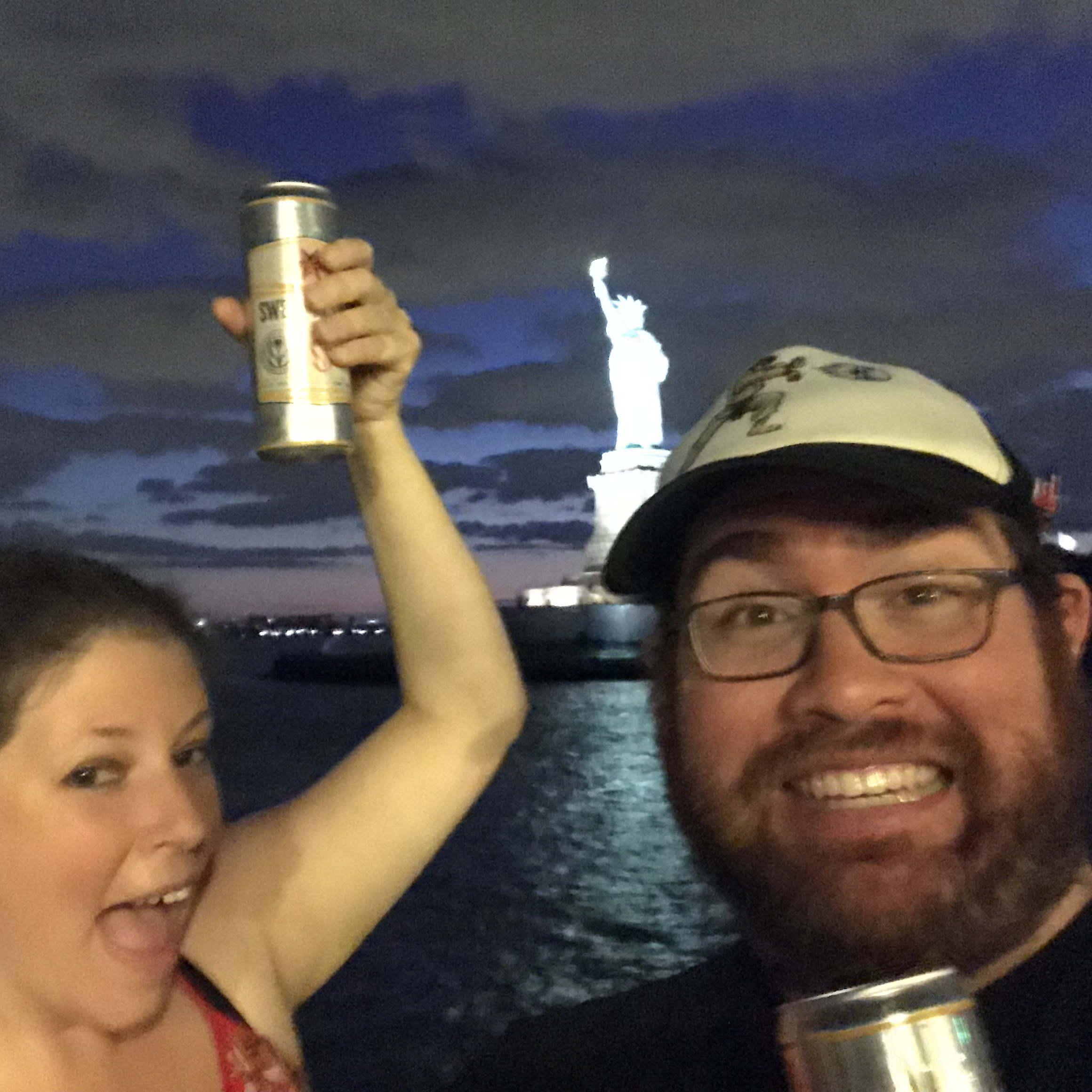 Cheers-ing the Statue of Liberty.