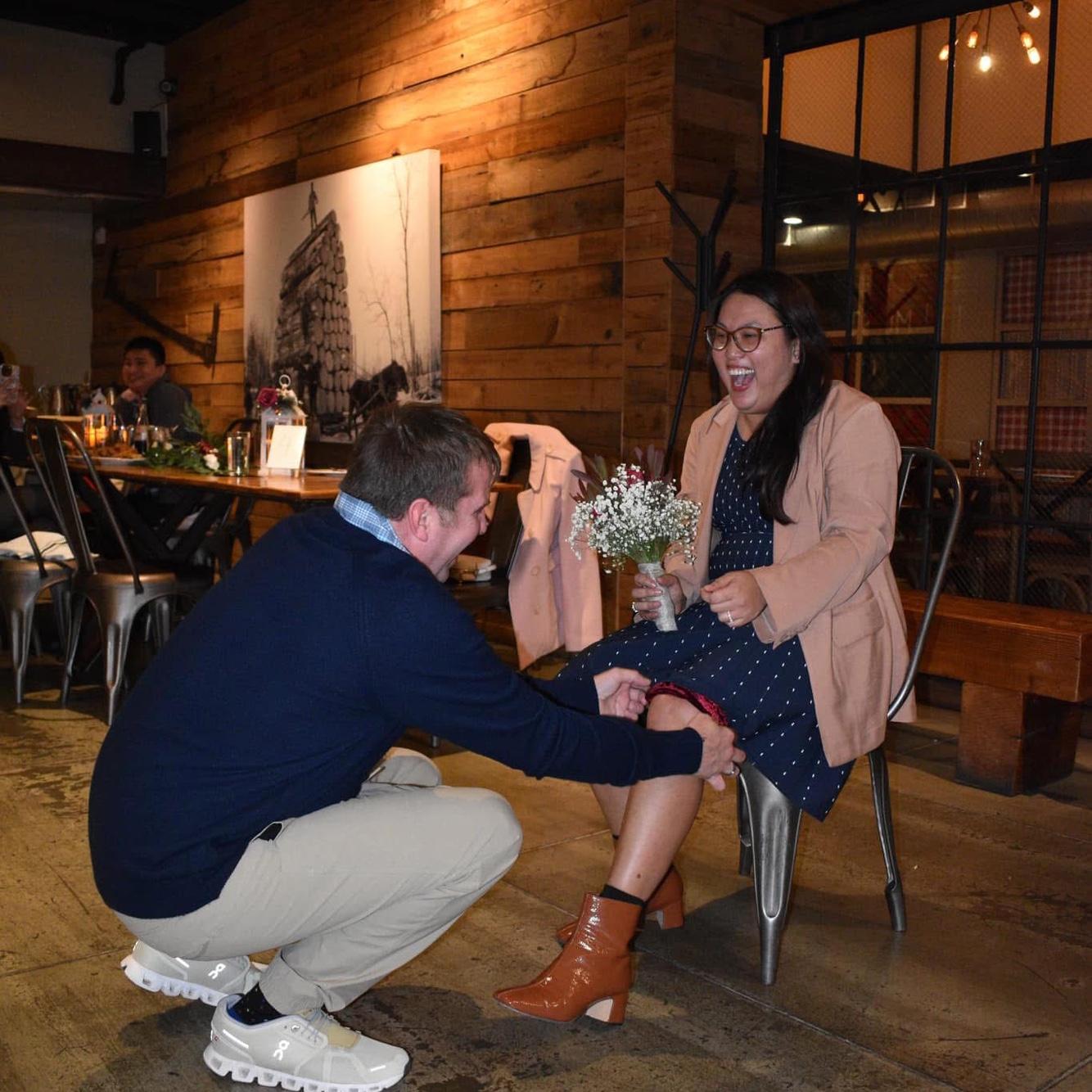 At my friend's wedding when they announce our engagement and Bob has to put the ribbon on my legs! he is so embarass!