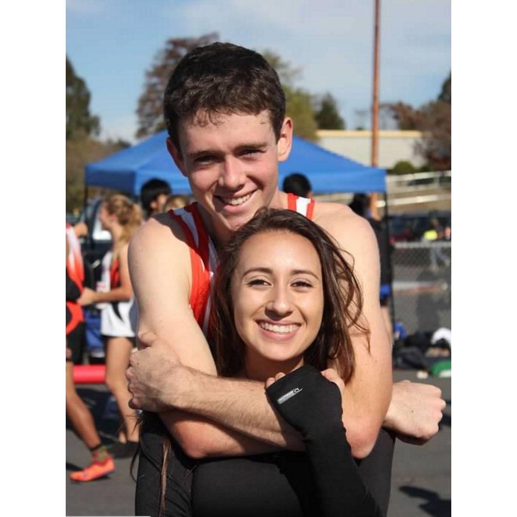 2015 - A nice warm, sweaty hug after Travis finished his cross-country race!