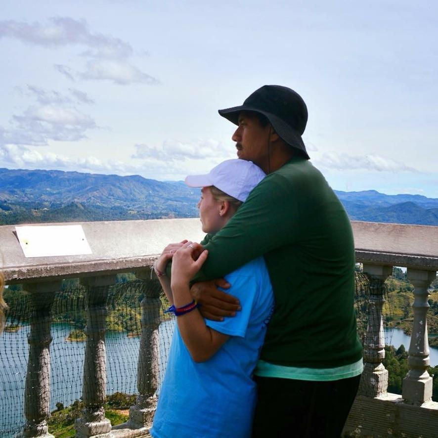 This is a candid photo that Angela Hembree took of us during our first mission trip together in 2018. We climbed La Piedra en El PeƱol de Colombia! (Climbed nearly 700 steps to the top of a rock!)