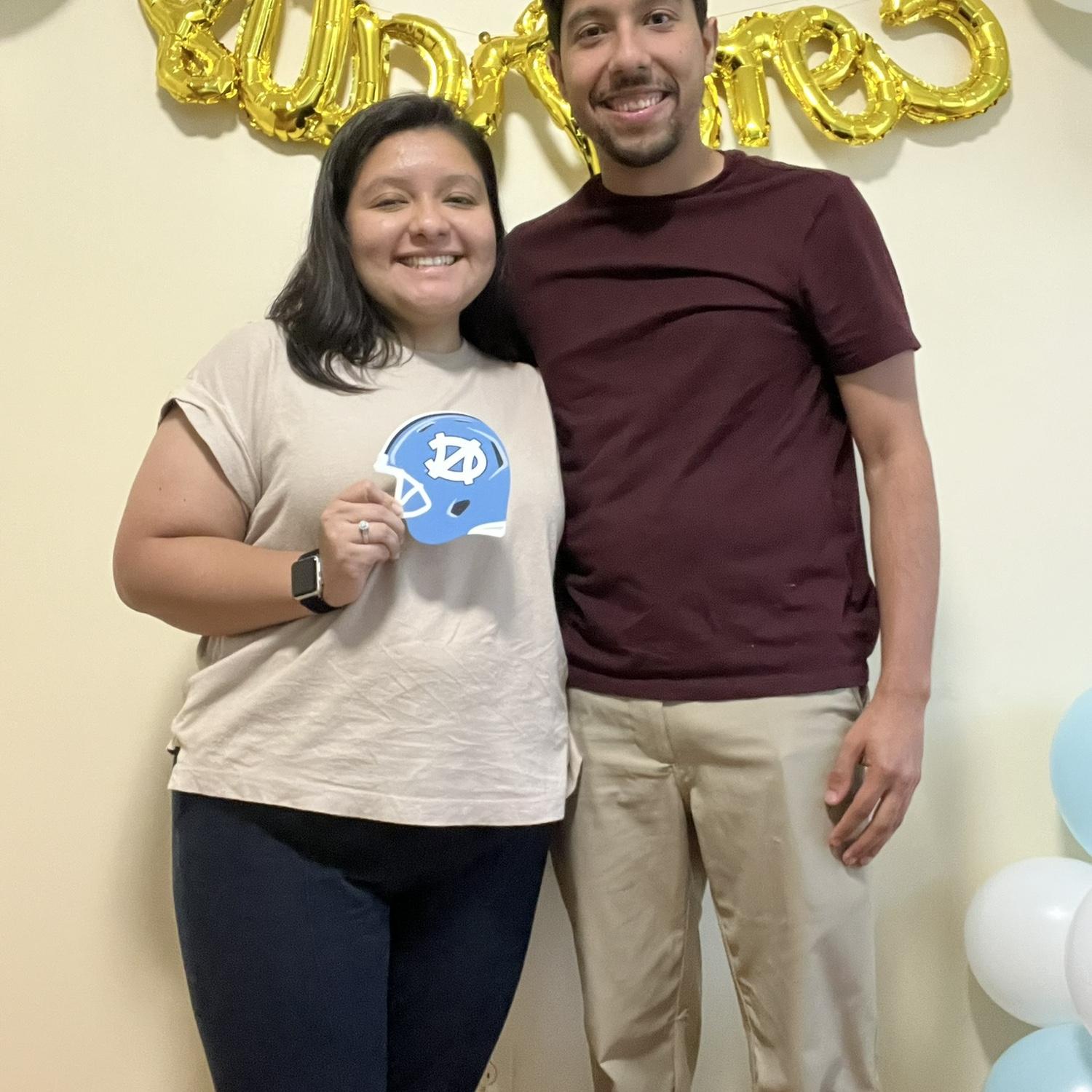 Celebrating another milestone together. / Celebrando otro logro juntos.
