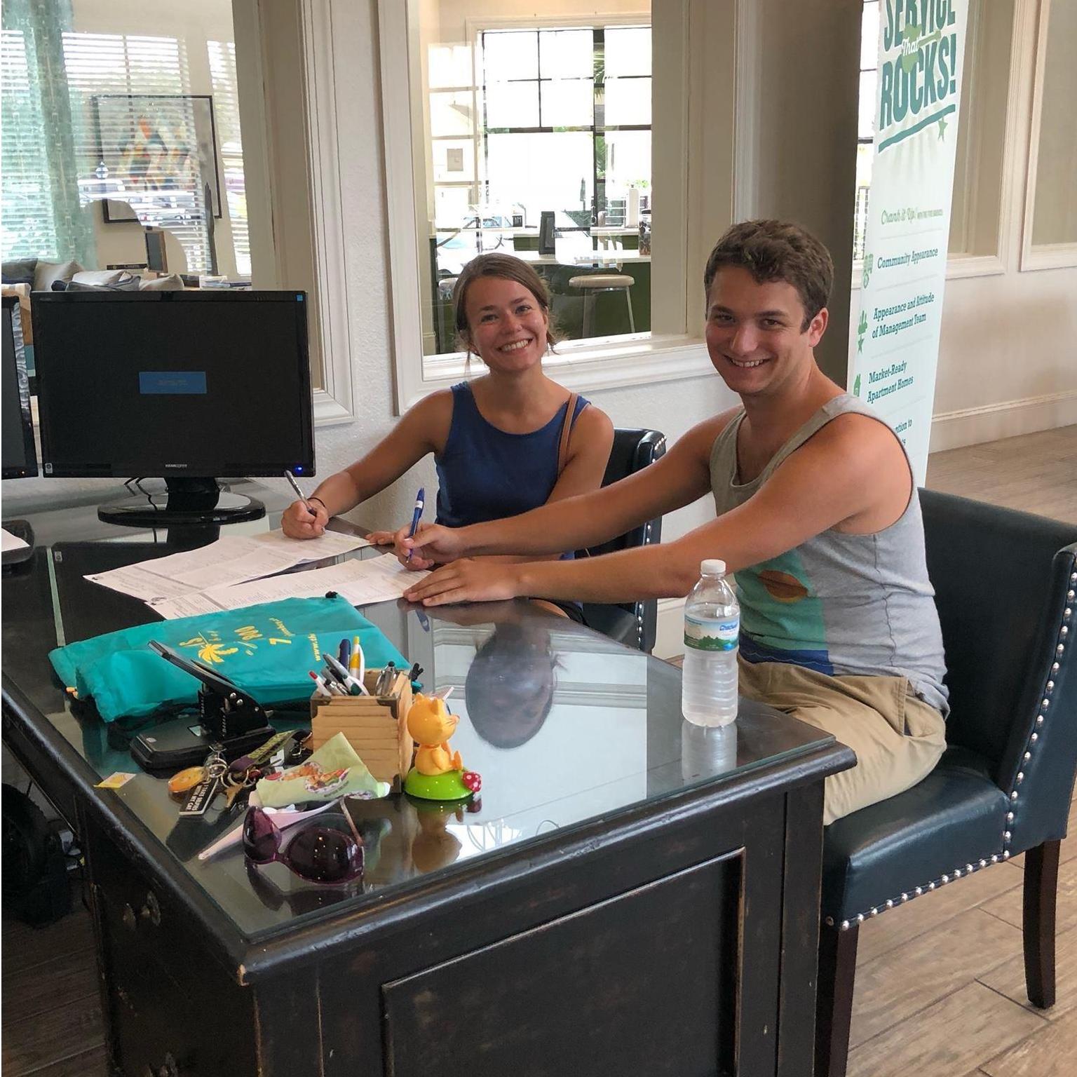 Signing the lease on our first apartment together!
