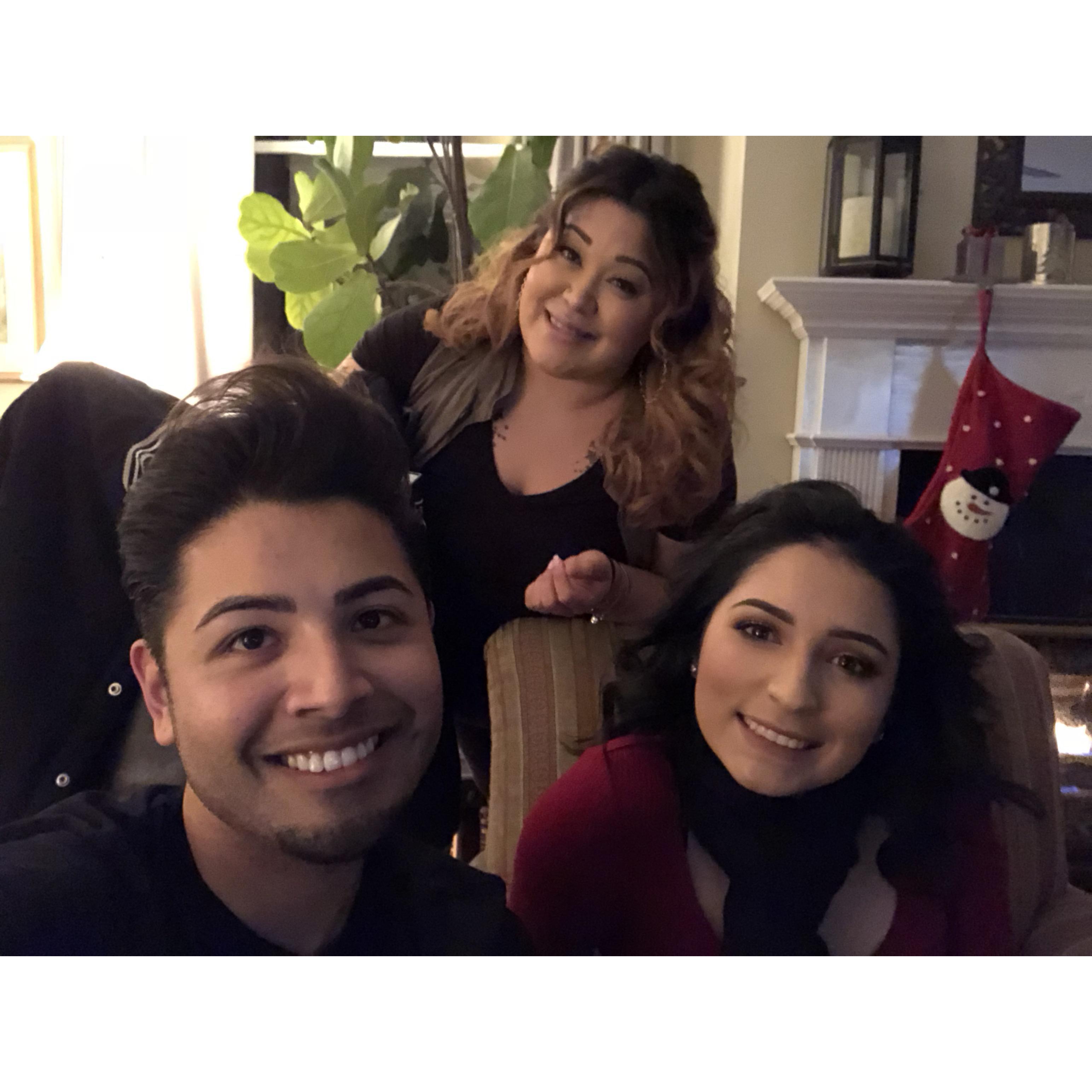 Robbie, Natalie and Carmen caroling the night away!