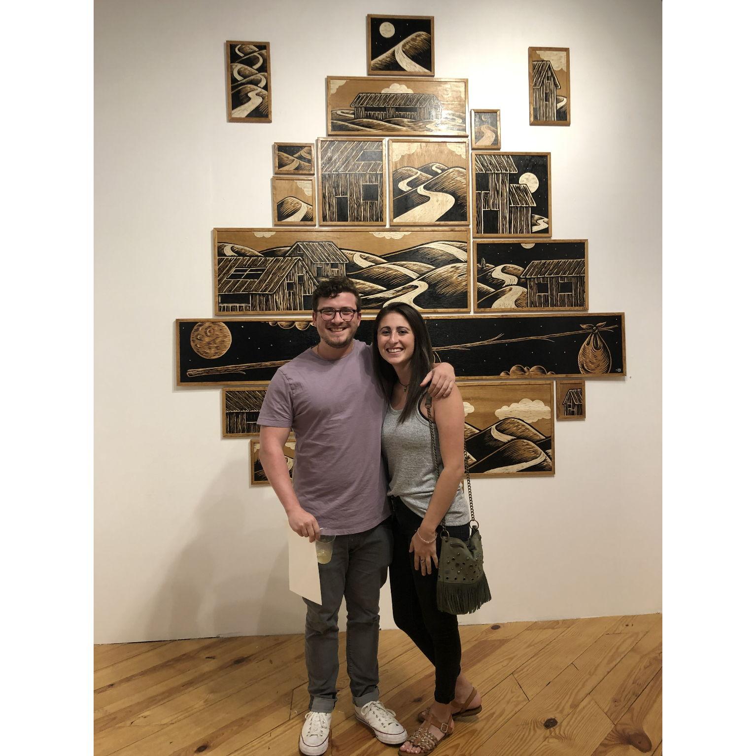 Our first picture together! Date night at the Preacher gallery two weeks after we met.