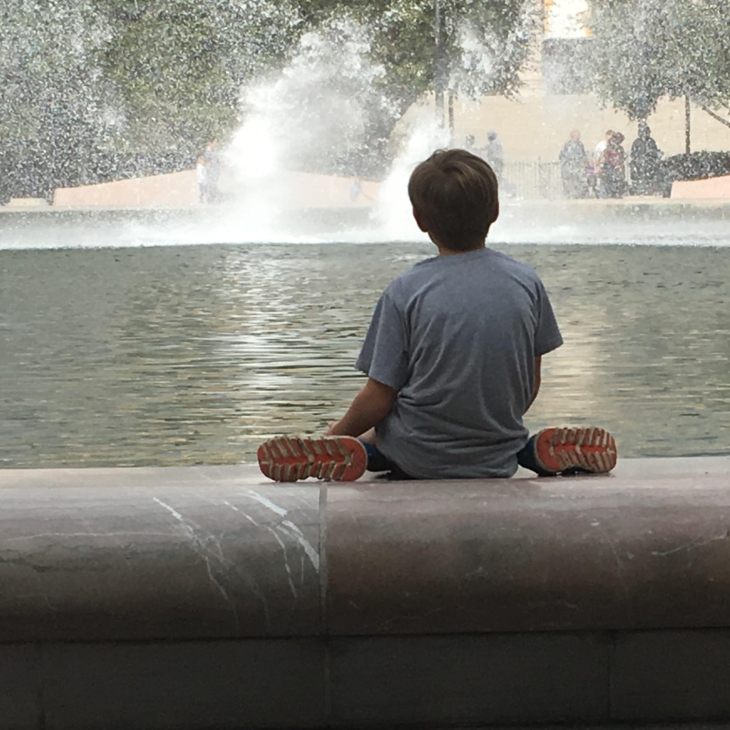 Taking a break at the fountain on our day trip to DC.