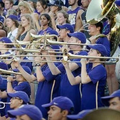 Playing at a home game (before we were dating) Groomsman to Jack's right, bride to his left- September, 2017