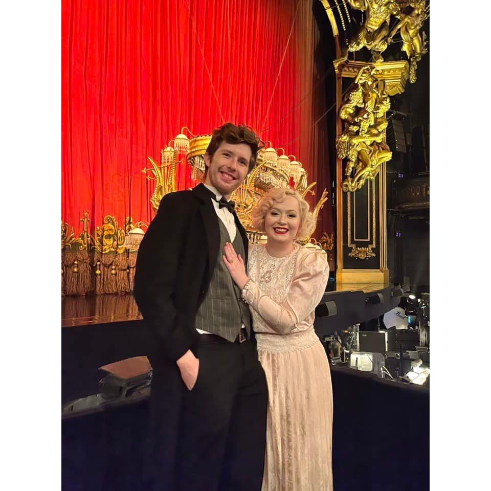 Dylan and Morgan in front of the stage at the Phantom of the Opera.