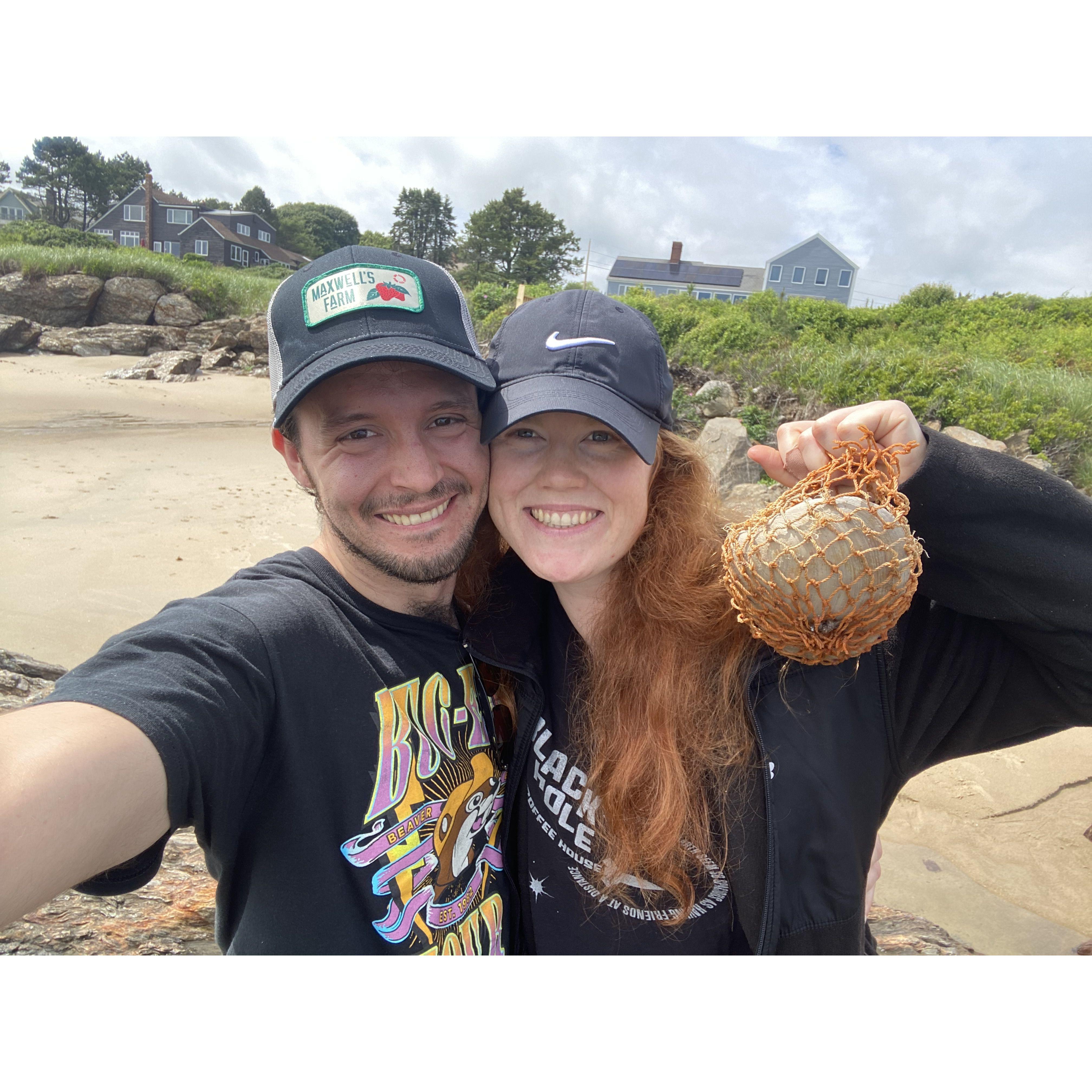 Collecting shells and beach garbage together in Maine
