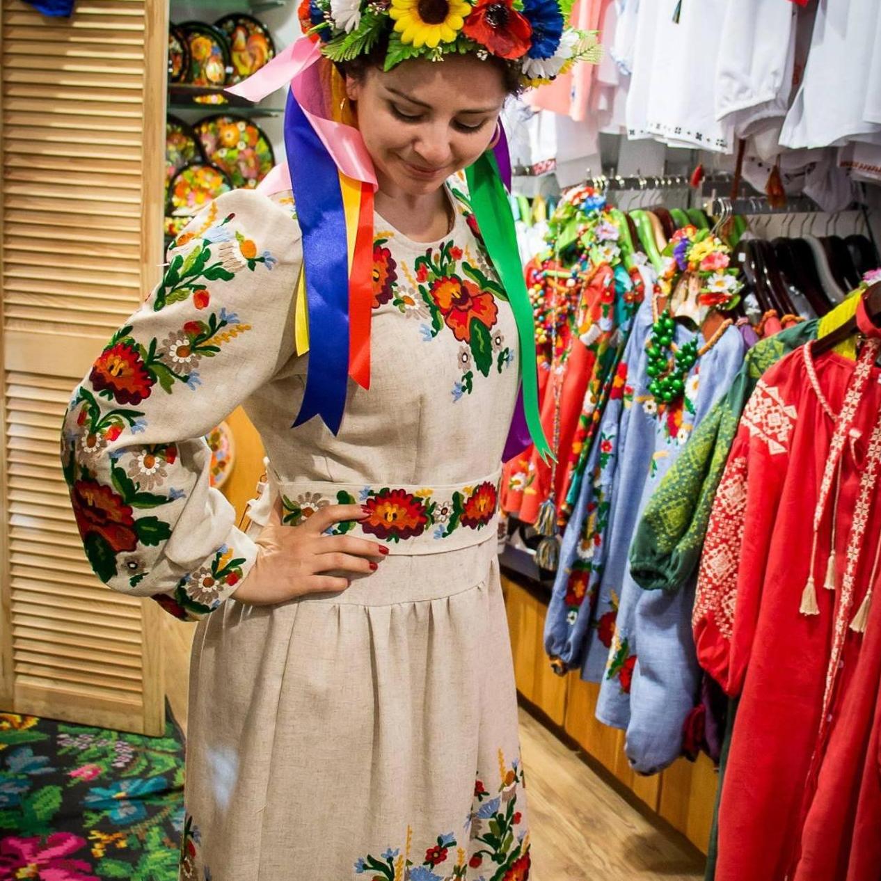 Lily trying on some traditional Ukrainian clothes on a trip to visit where she was born