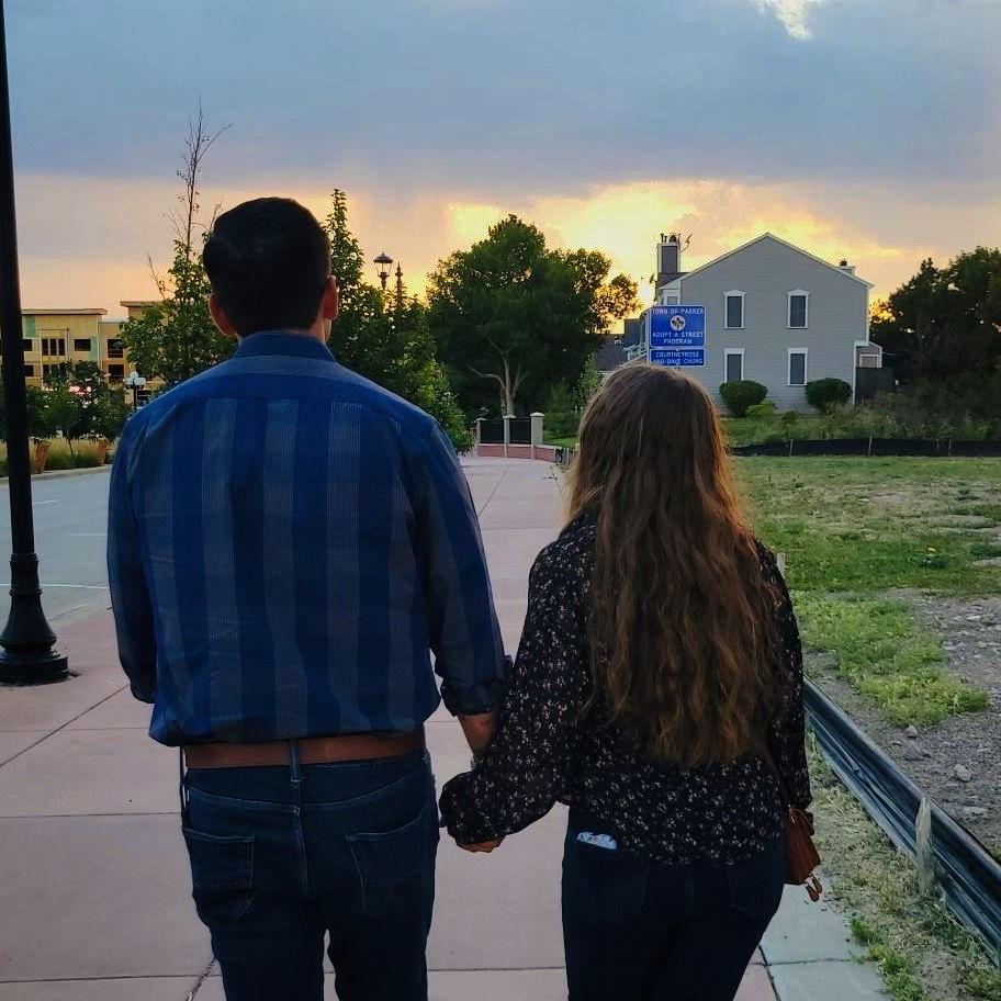Keely Barney (bridesmaid) snapped this photo of us on our first double date about one month into our relationship. Its the first real photo we have of us and one of our favorites.