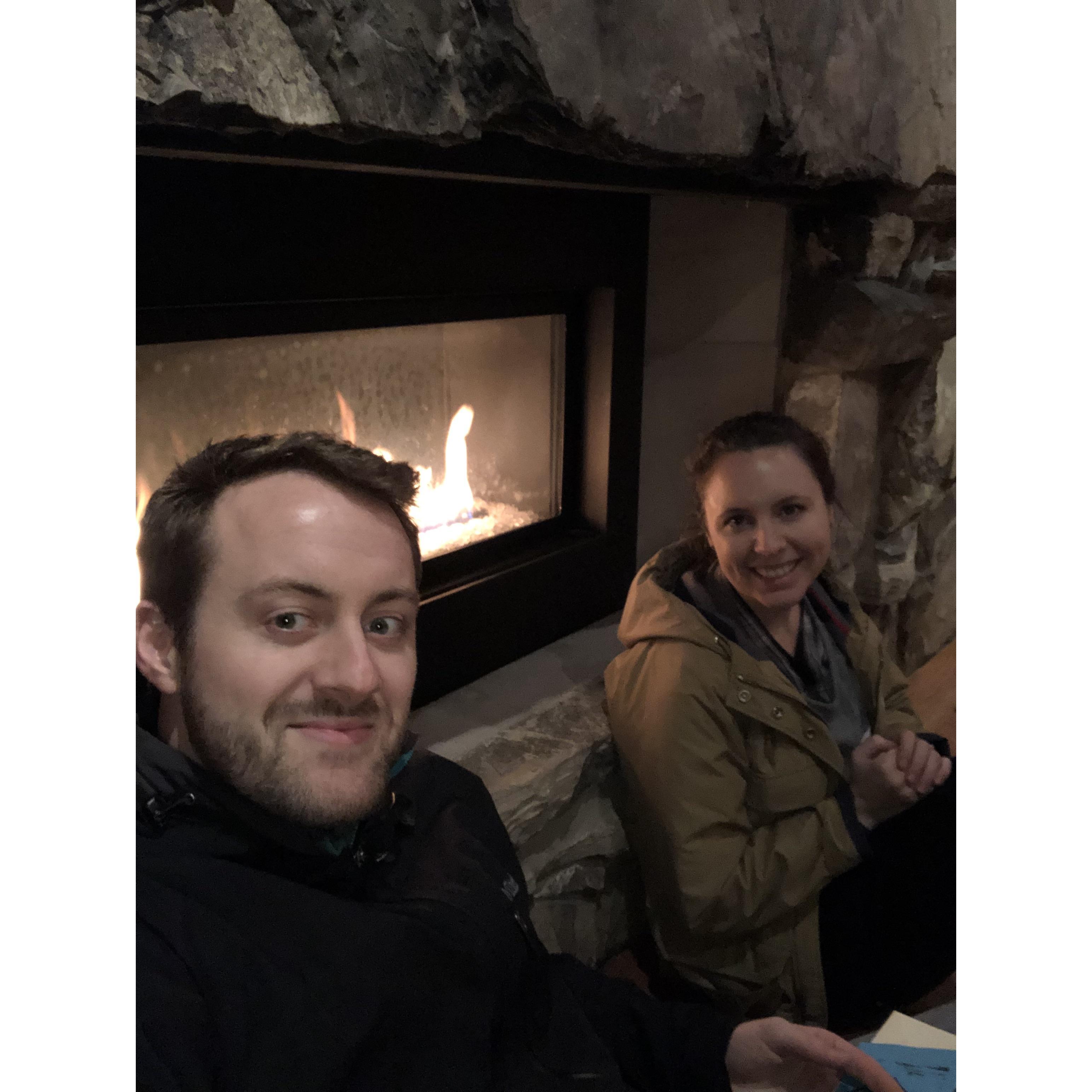 Sitting in front of the fireplace the night we moved into our house.