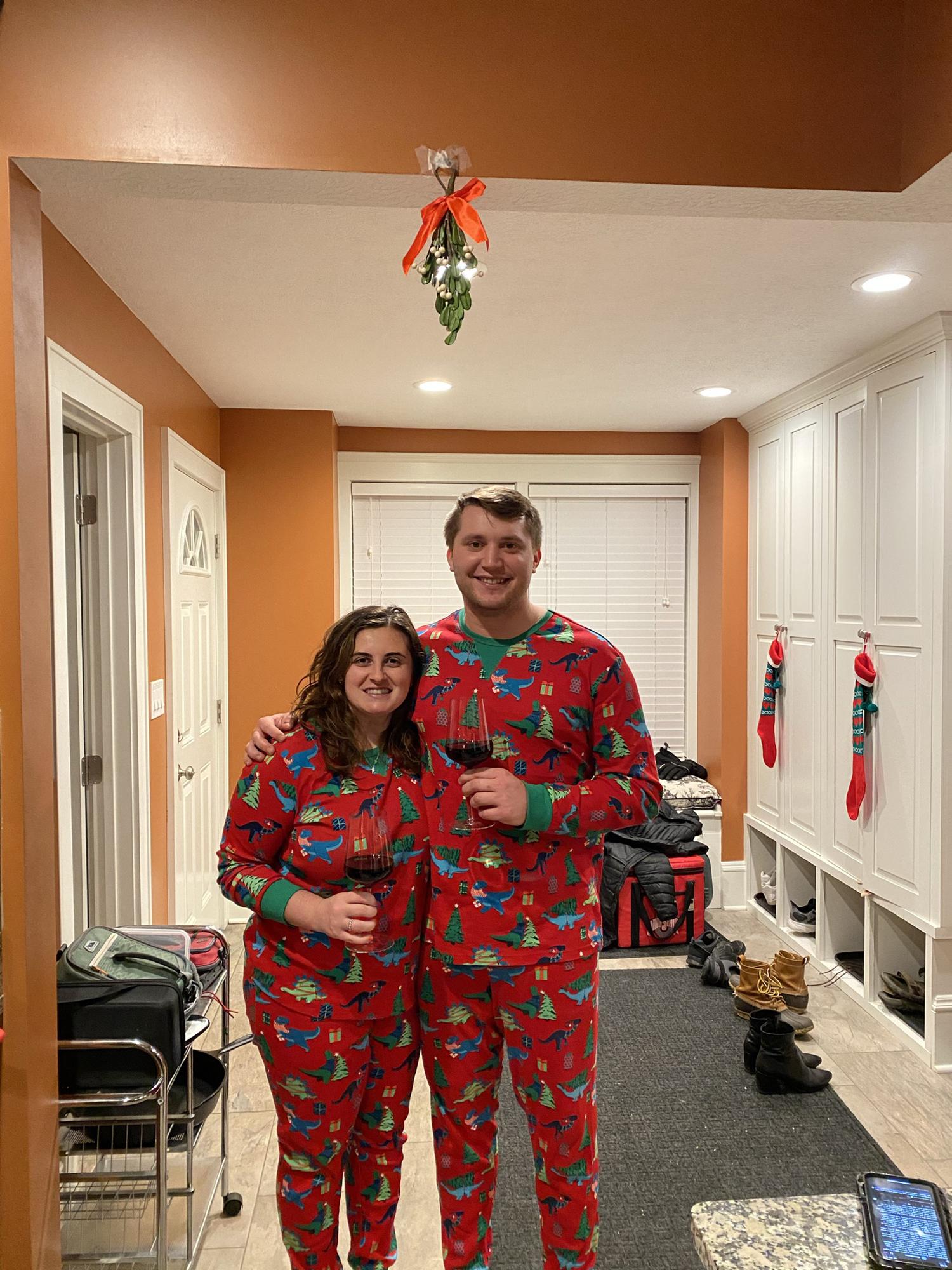 Sam talked David into matching Christmas PJs with Dinosaurs🦖
