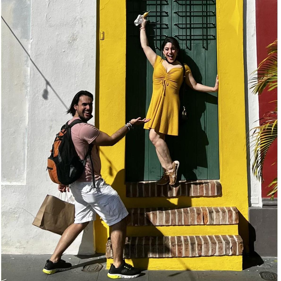 Our engagment trip to San Juan, Puerto Rico, in front of the World's narrowest building.