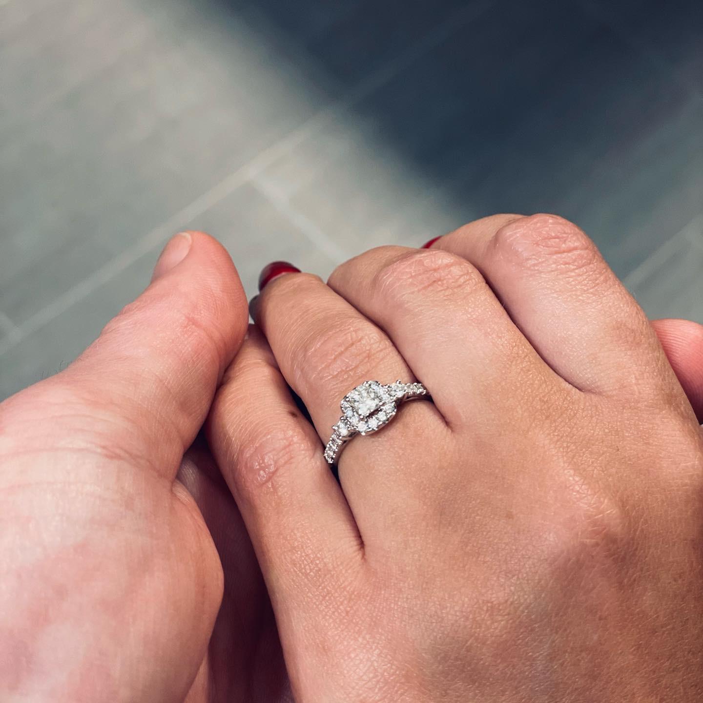 He popped the question! She said yes!
