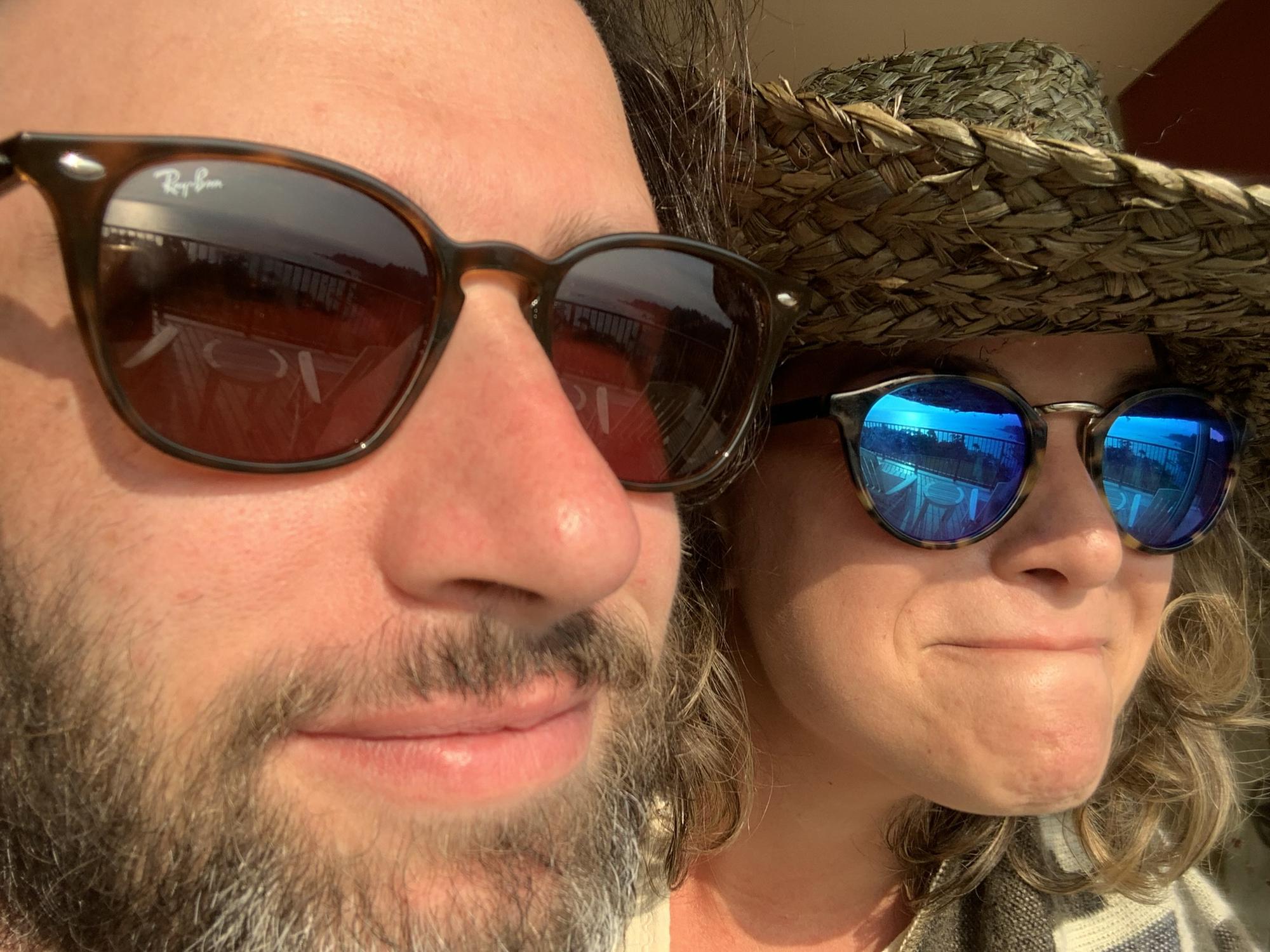 Taken in Carmel by the sea — we were trying to catch the reflection of the sunset in our sunglasses so we could have a photo with it. Was hard to hold back our laughter 😇