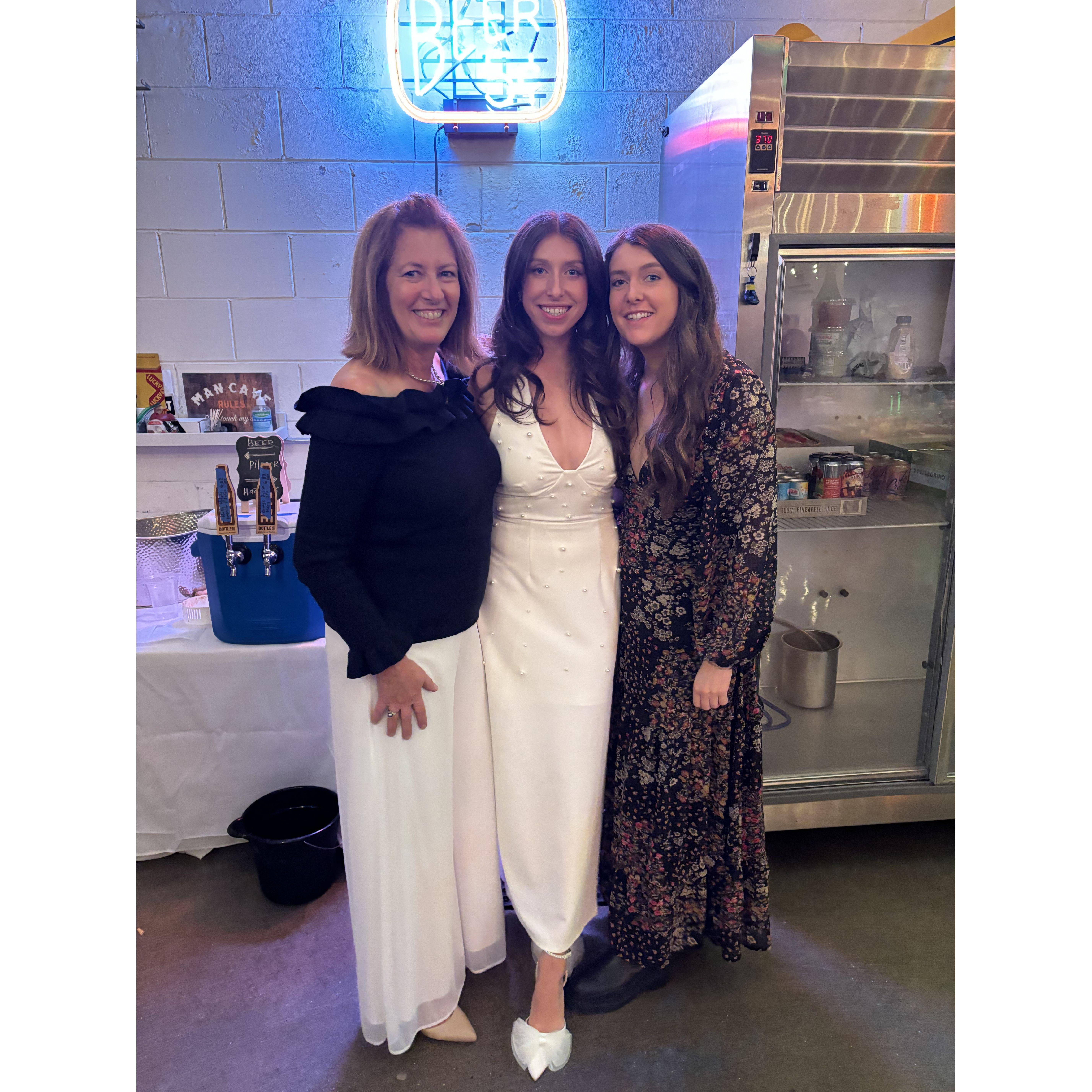Mother of the bride and bridesmaid Cori at the engagement party