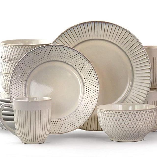 Elama Market Finds 16 Piece Round Stoneware Dinnerware Set in Embossed White