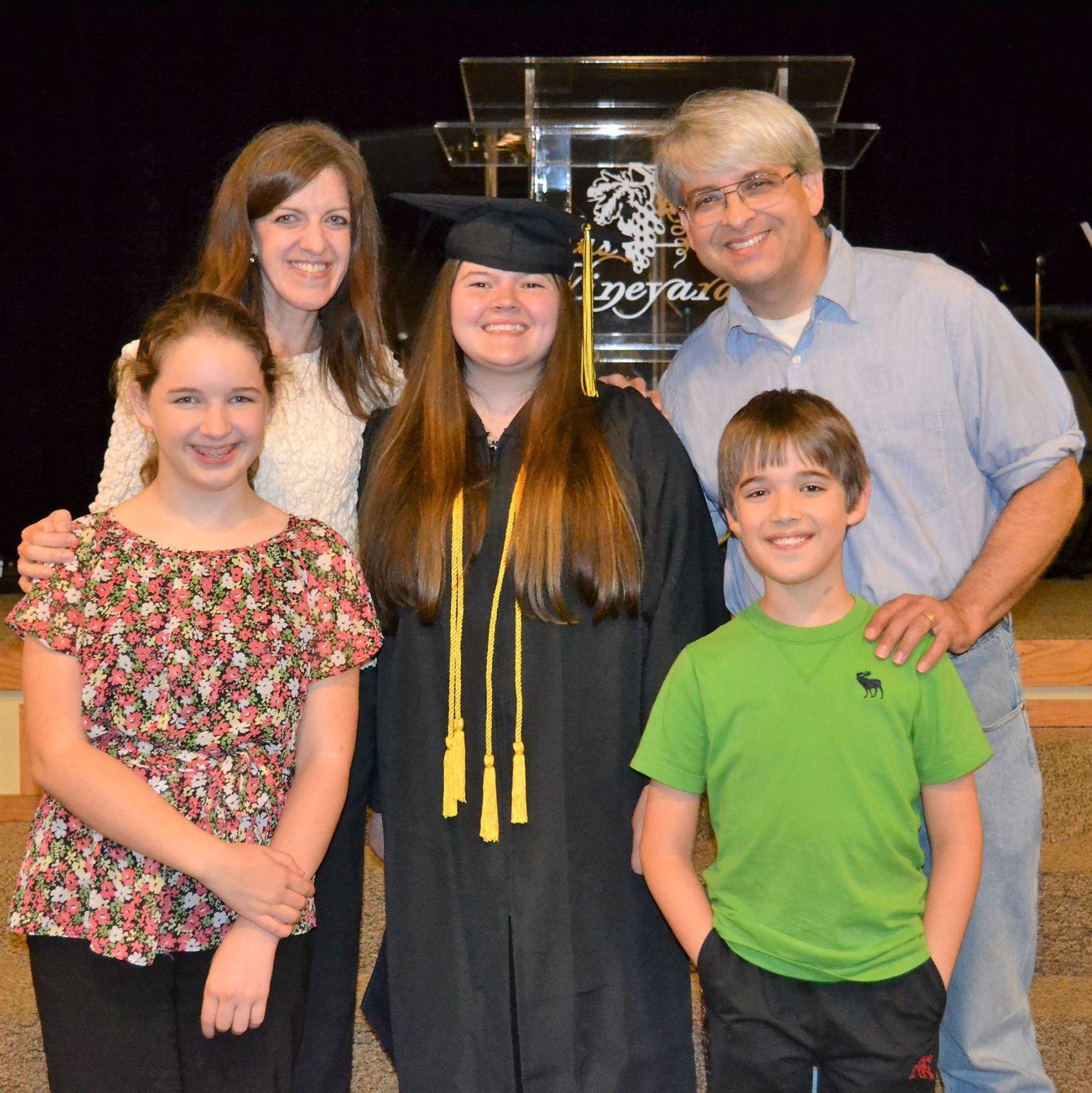 Kaitlyn with bridesmaid, Christa Saadoon, and Beth, Komron, and Josh Saadati