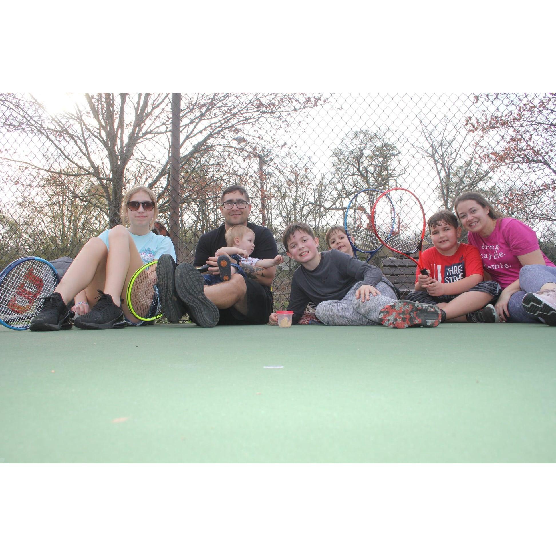 We found out on our holiday that the kids loved tennis. Which is awesome because we both played in high school!