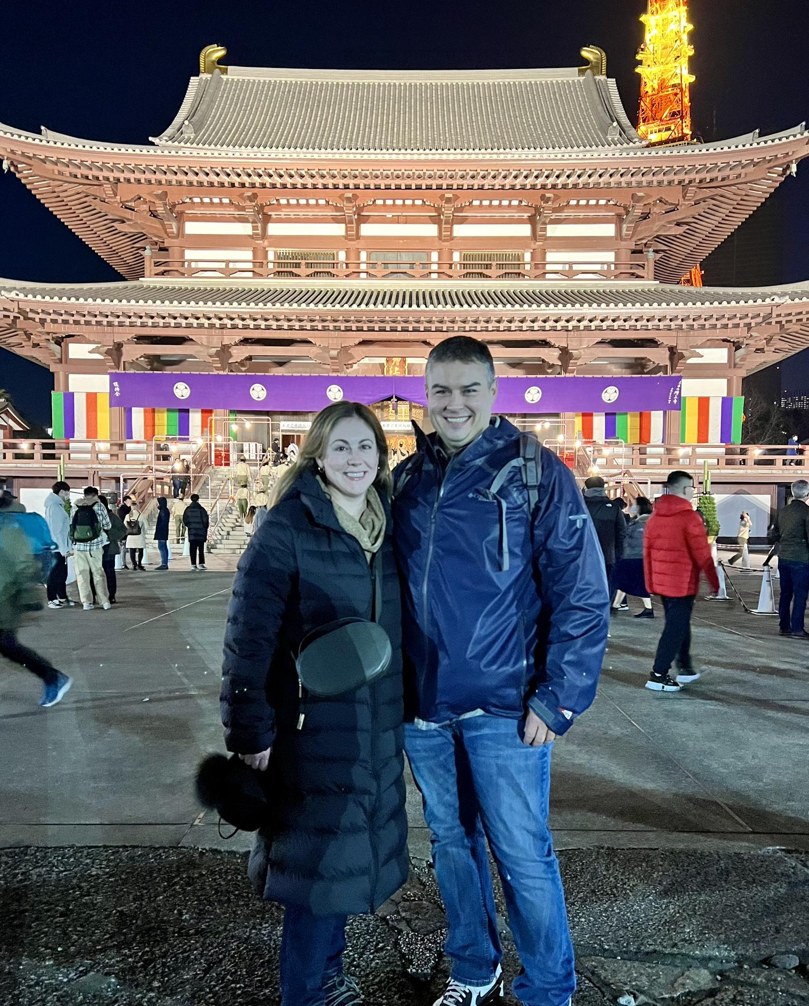 Jeff proposed to Liz on New Year's Eve 2022 in Japan in a maple forest on the way to this Buddhist Temple.