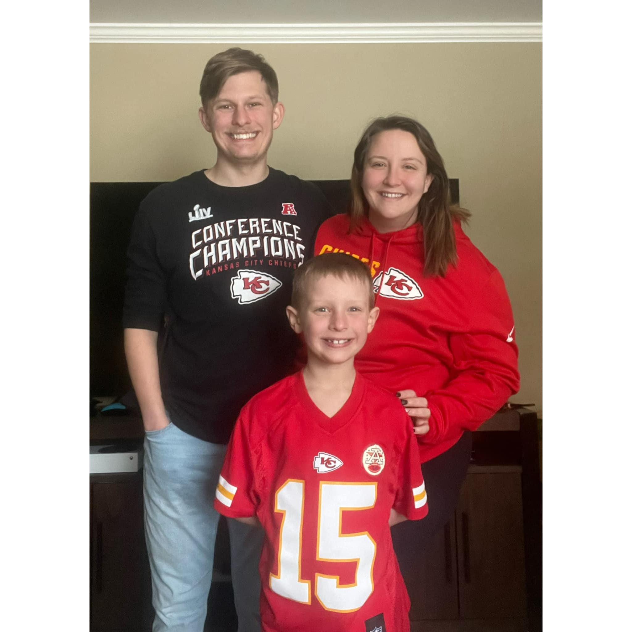 Our family decked out in Chiefs gear—we love cheering for our favorite team together!