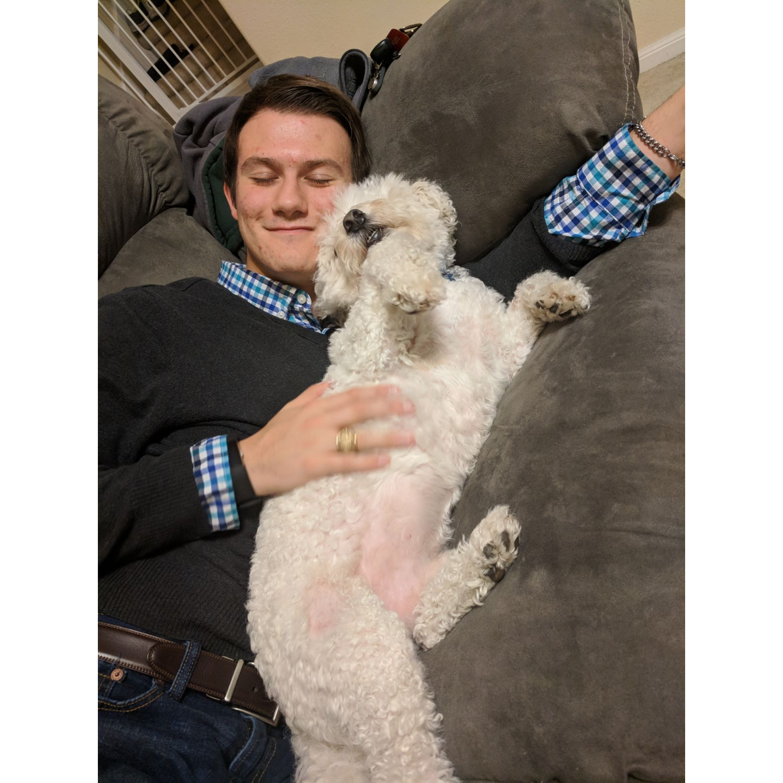 Quinton cuddling with Beth's dog (Rowdy)