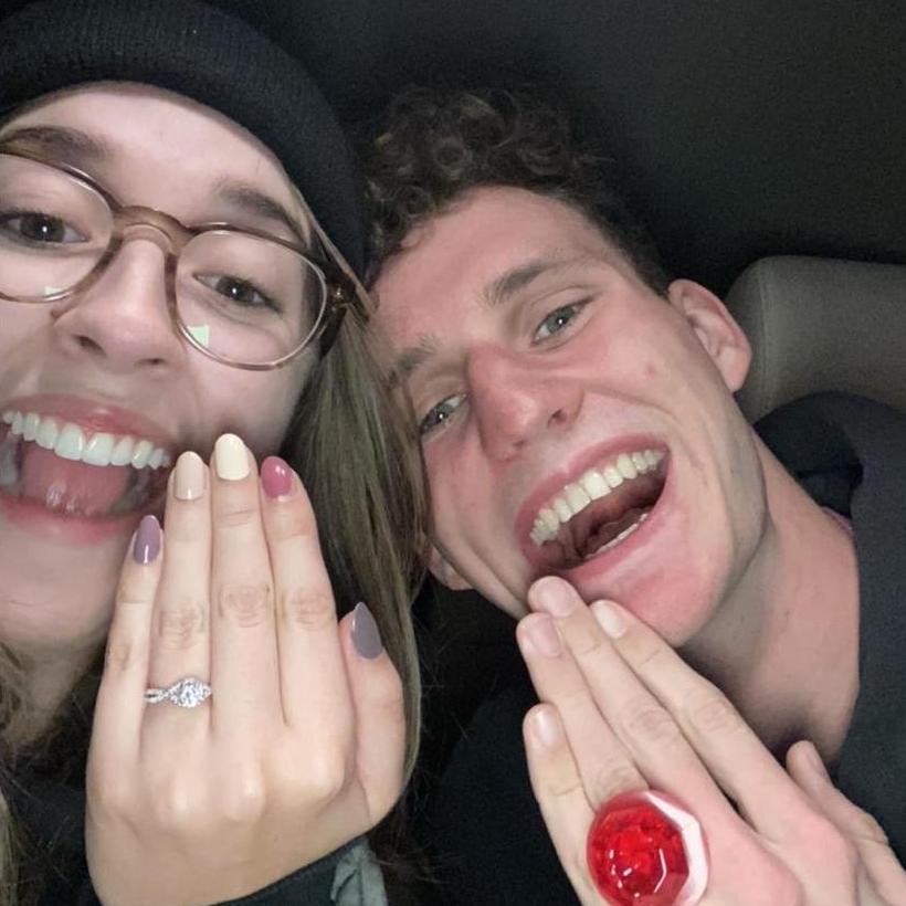 Both of us with our rings right after he proposed.
