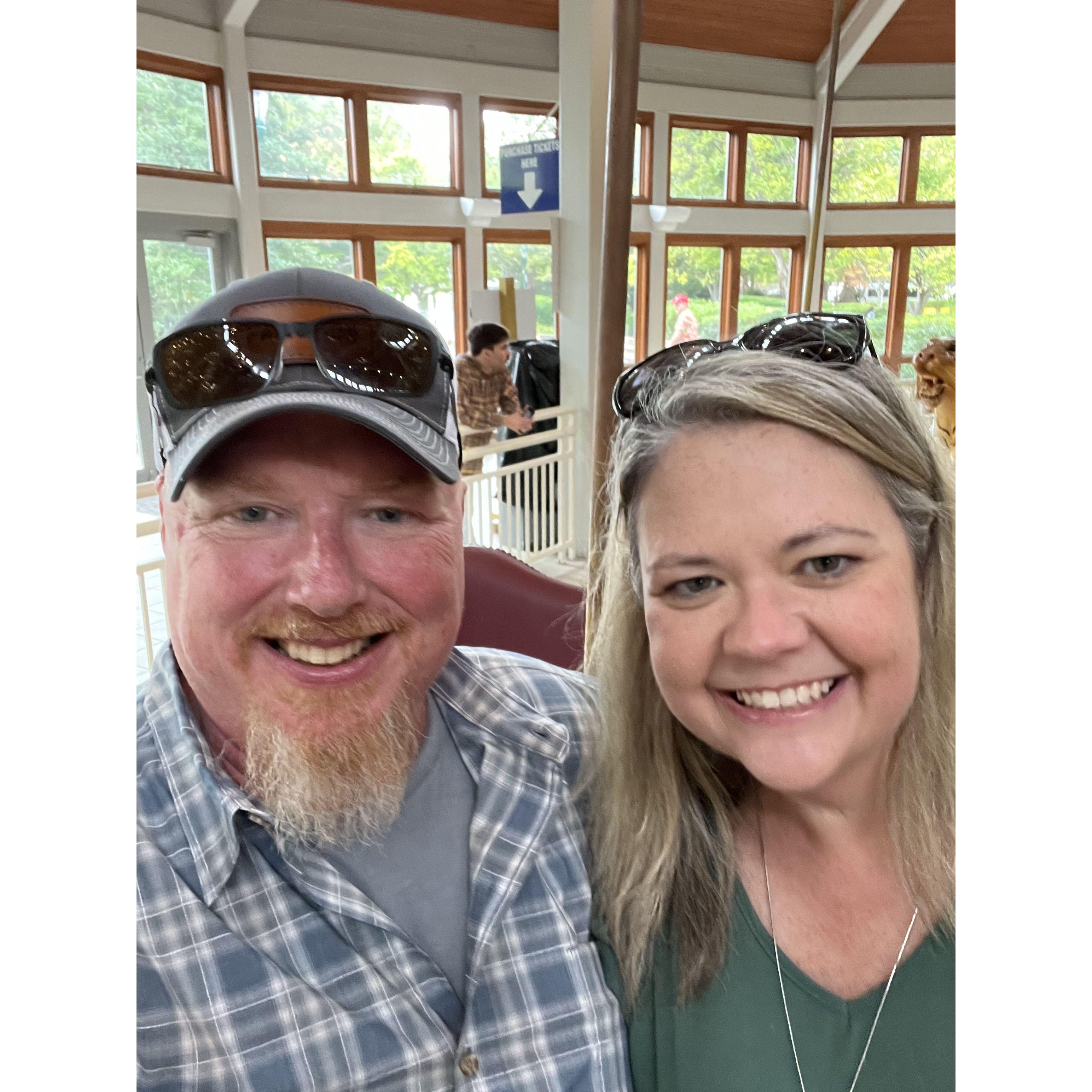 On the carousel at Coolidge Park right after James proposed!
