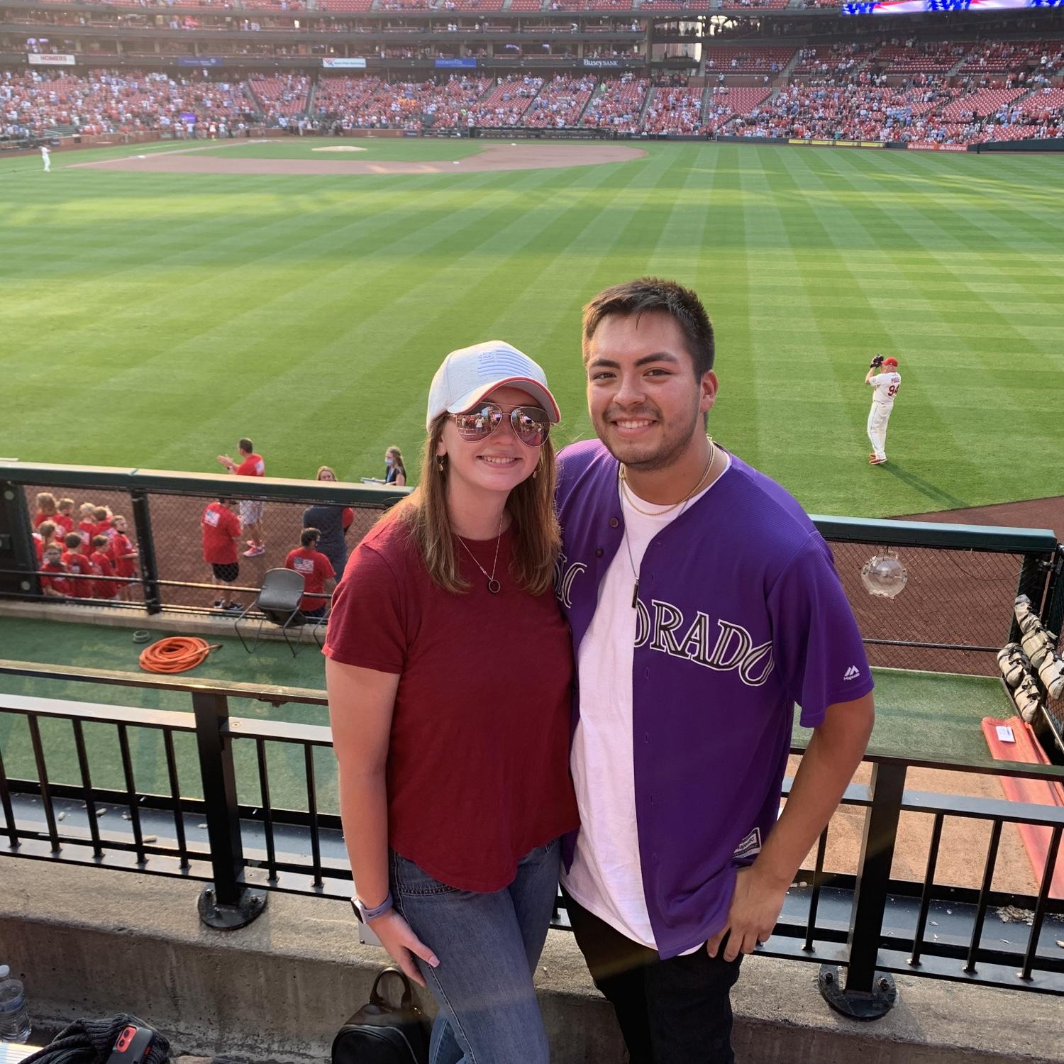 First baseball game together. Roman was not happy that it was for the St. Louis Cardinals.