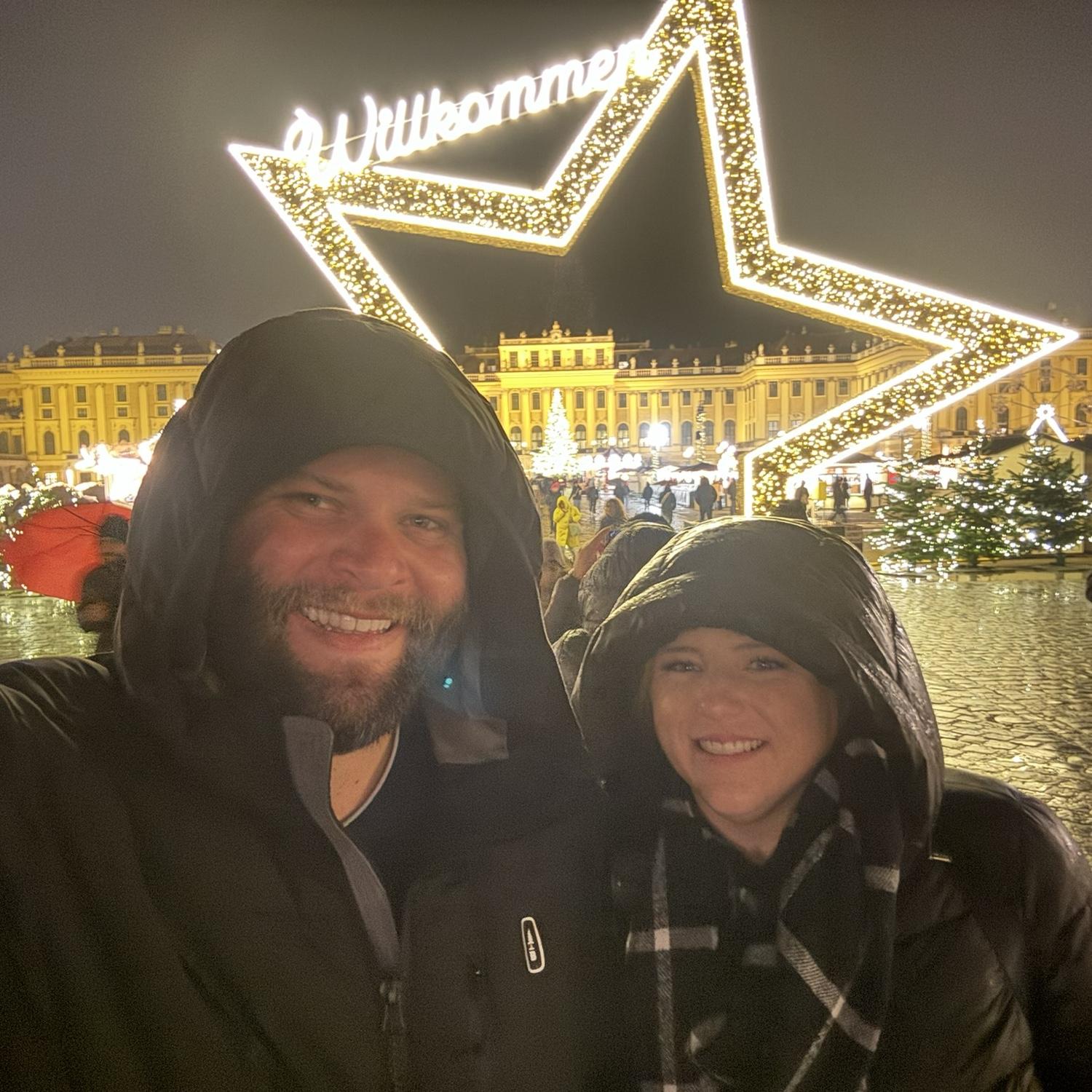 Rainy night in Vienna Austria enjoying the Christmas market outside Schönbrunn Palace