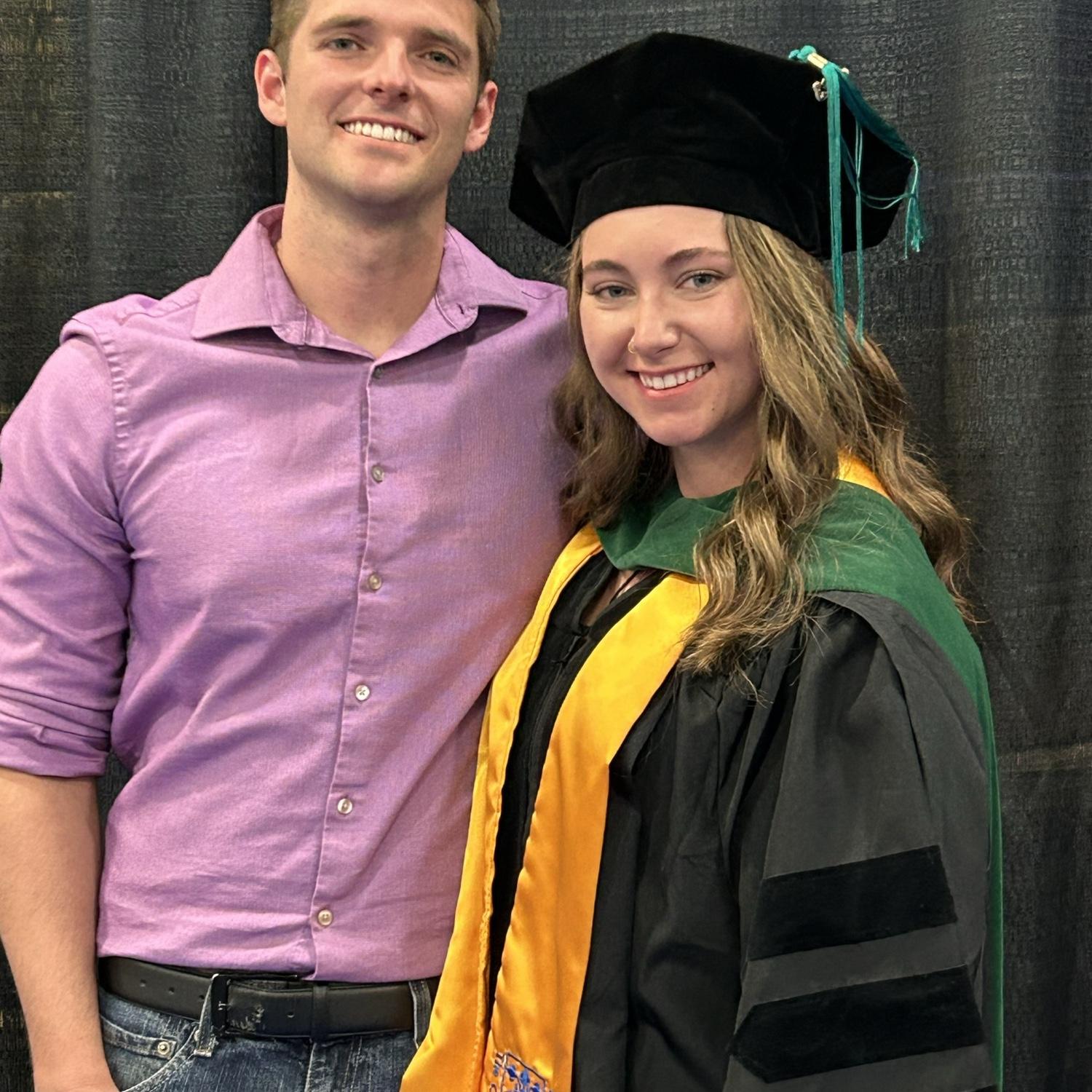 Daniel flew on a red-eye flight to make it to Lexi's DPT graduation in Minnesota