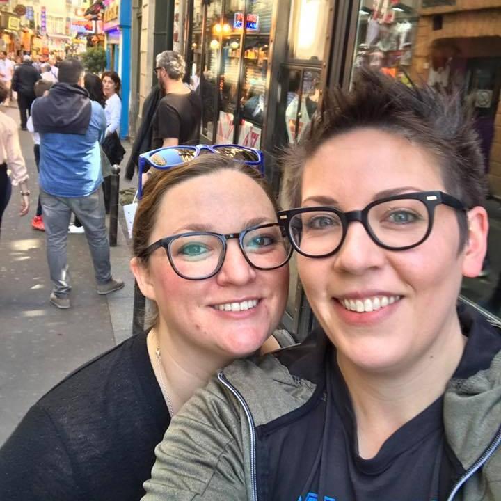 M: We're happy in Paris, after eating the world's best falafel.
A: The line was, like, really long.
M: #worthit