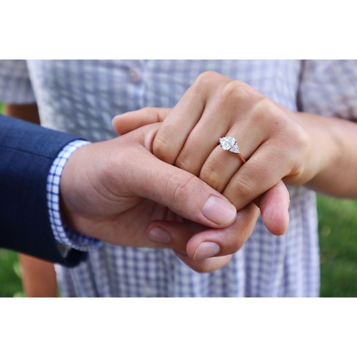 The ring! Jake did good. It is so special to us that the gold from Jake's mom's wedding ring was the gold used to make my engagement ring band!