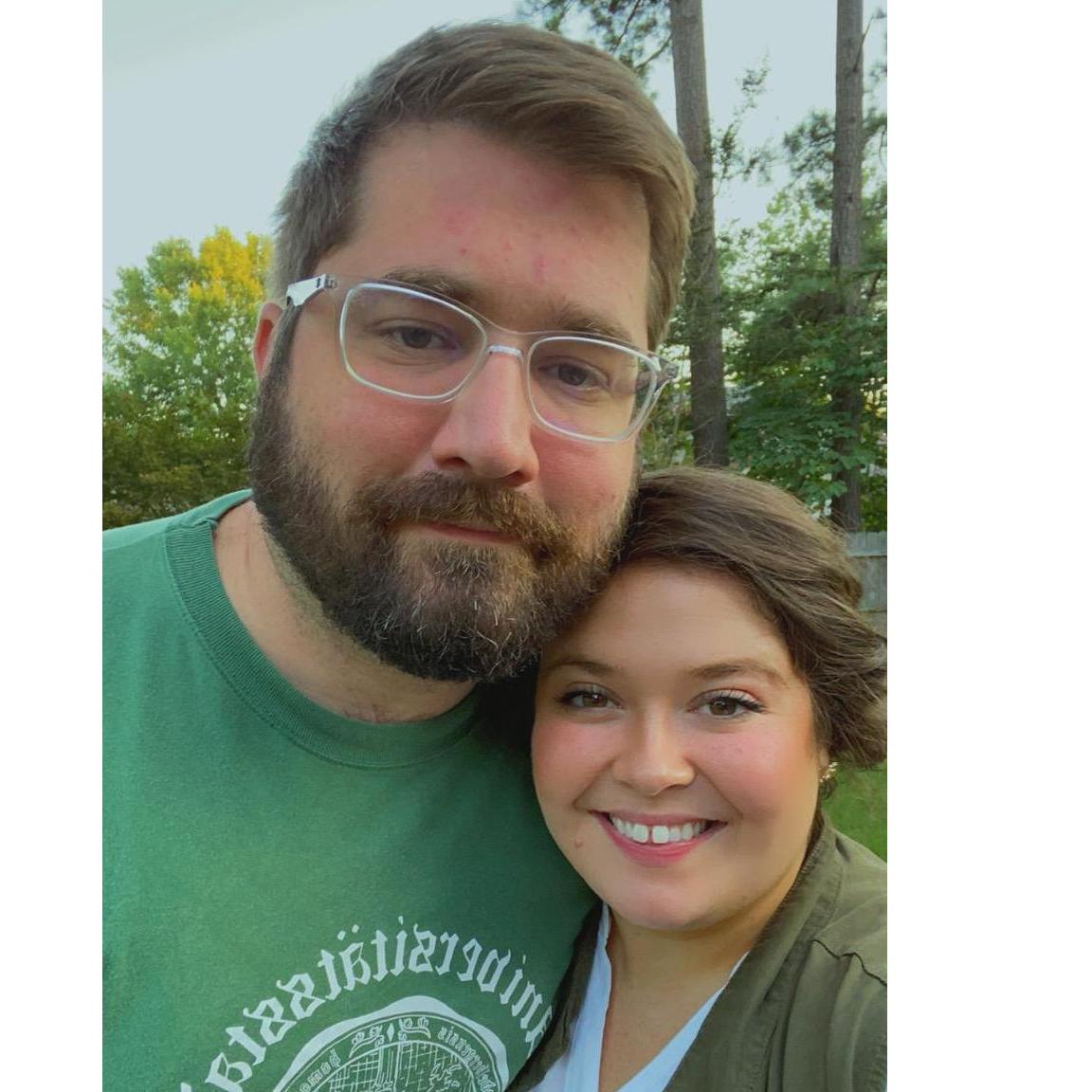 Checking on our crop of peas we planted in the backyard!