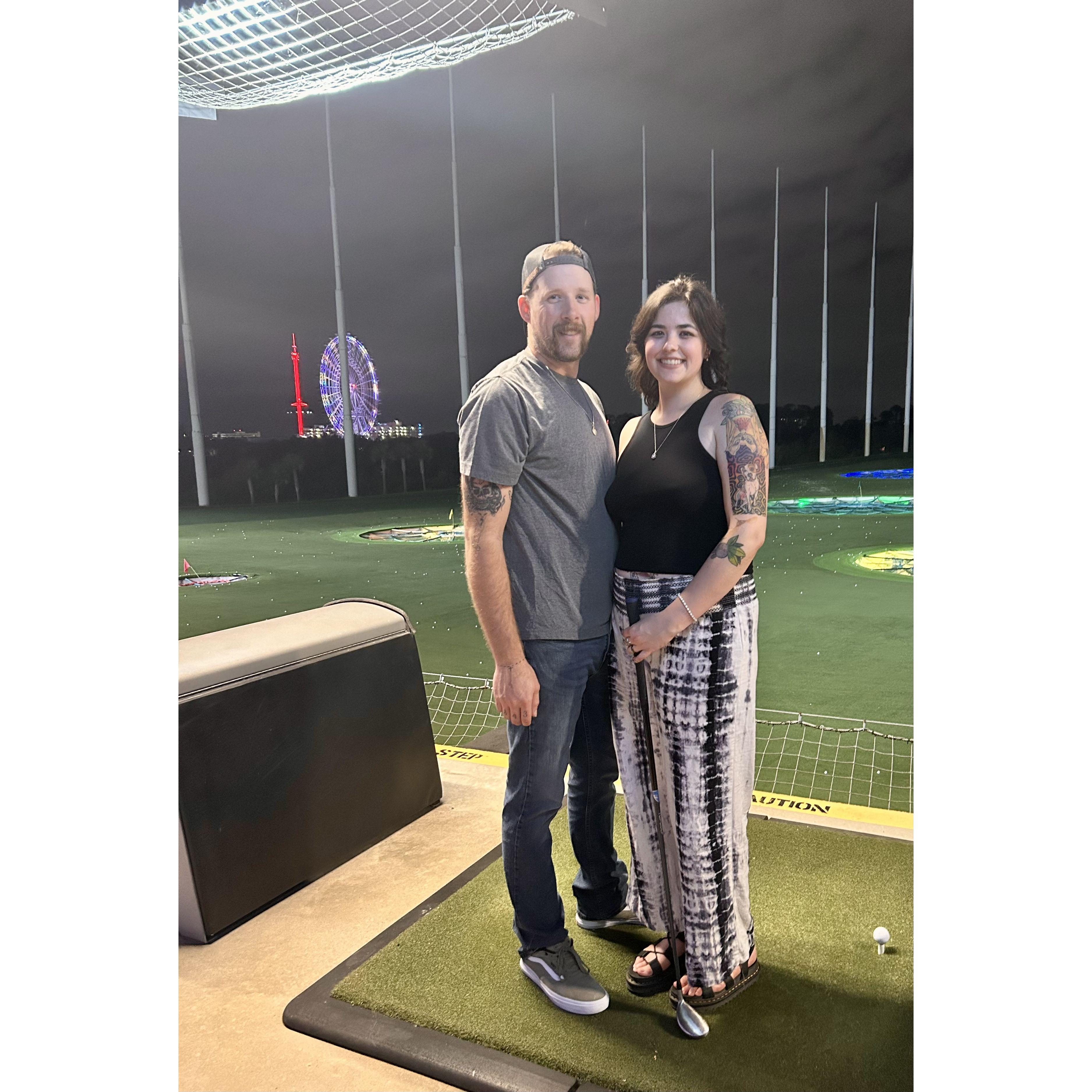 We got engaged on that Ferris wheel behind us!