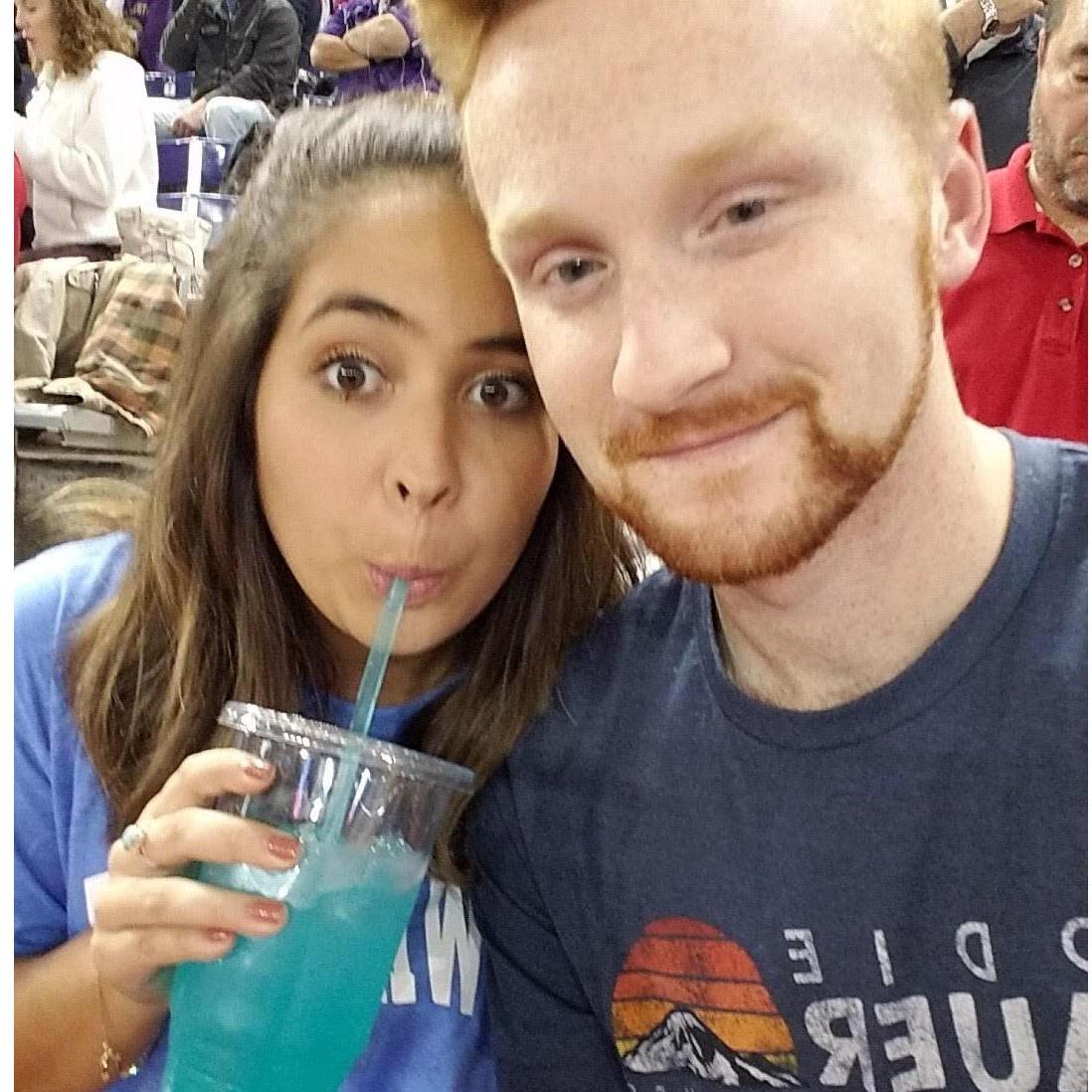 Watching a cousins football game and drinking lemonade