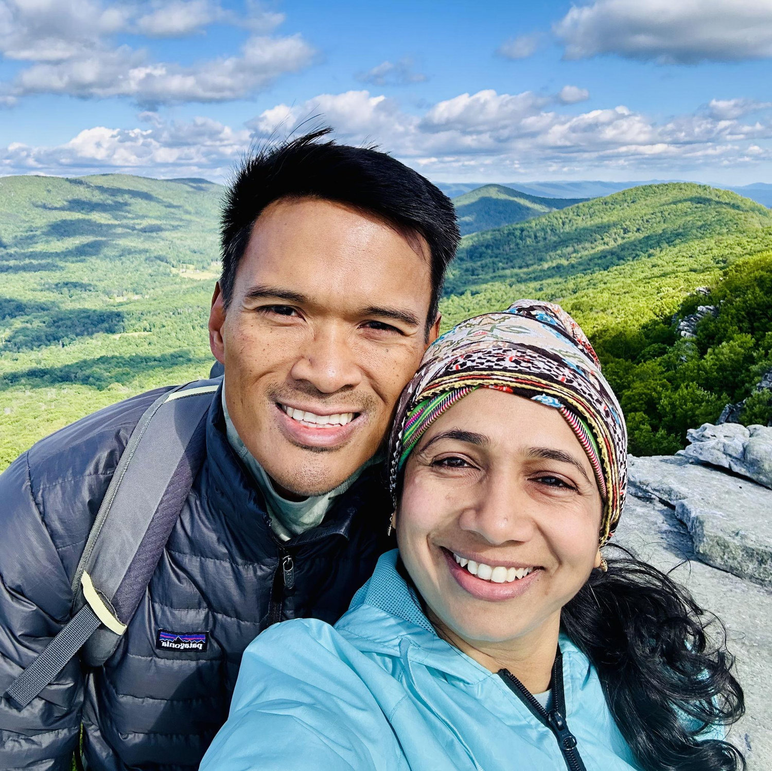 Happiest on top of mountain peaks