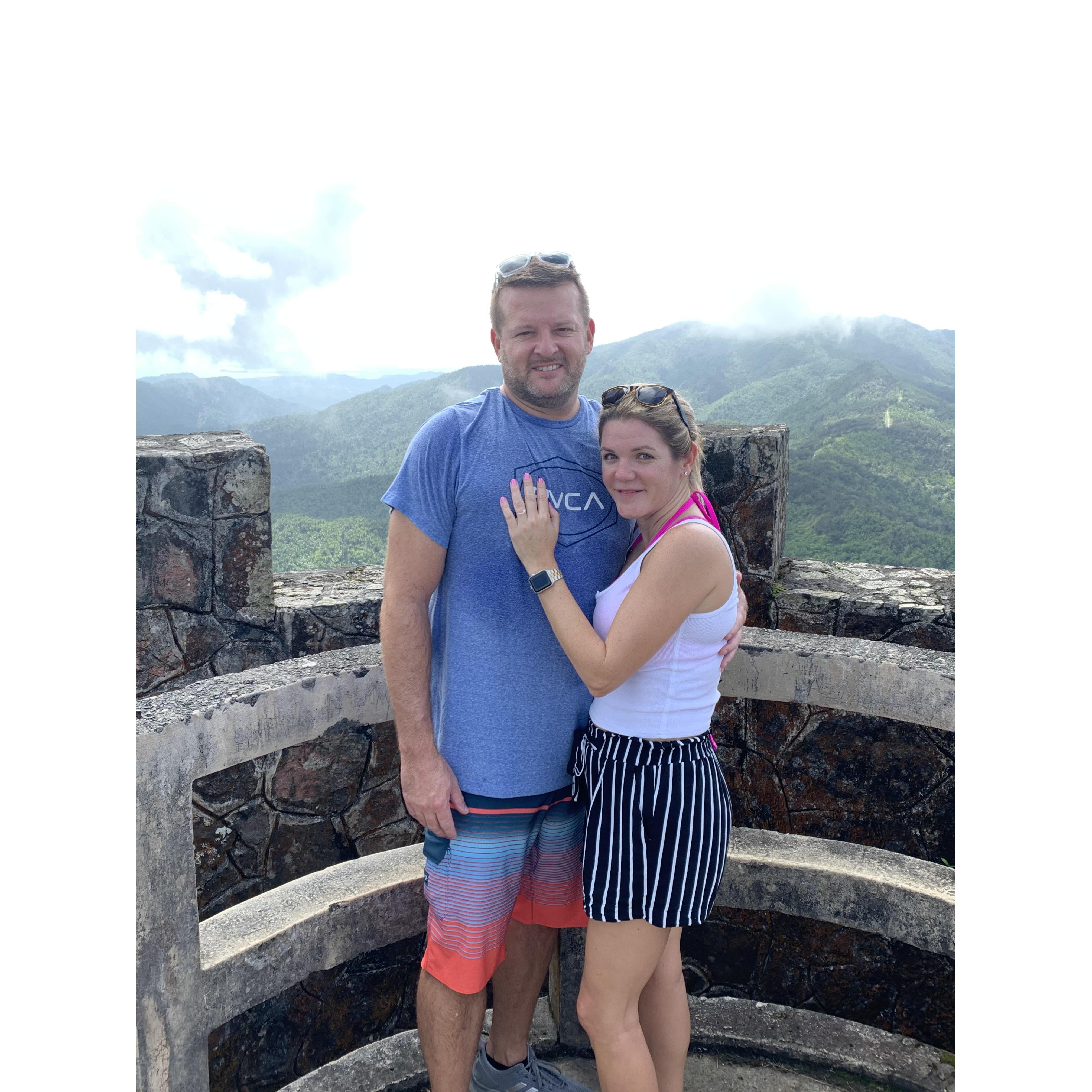 The top of the tower at the top of the mountain, right after Tom proposed.
